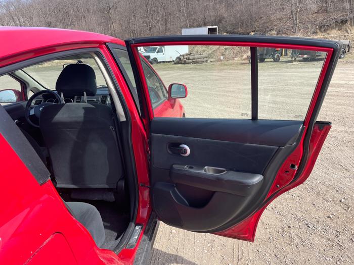 2011 nissan versa 1.8-sl-hatchback with 161381 miles for sale near jordan, minnesota 0842ef9bf3f7443fbeb9f00bcdb2fc88.jpeg