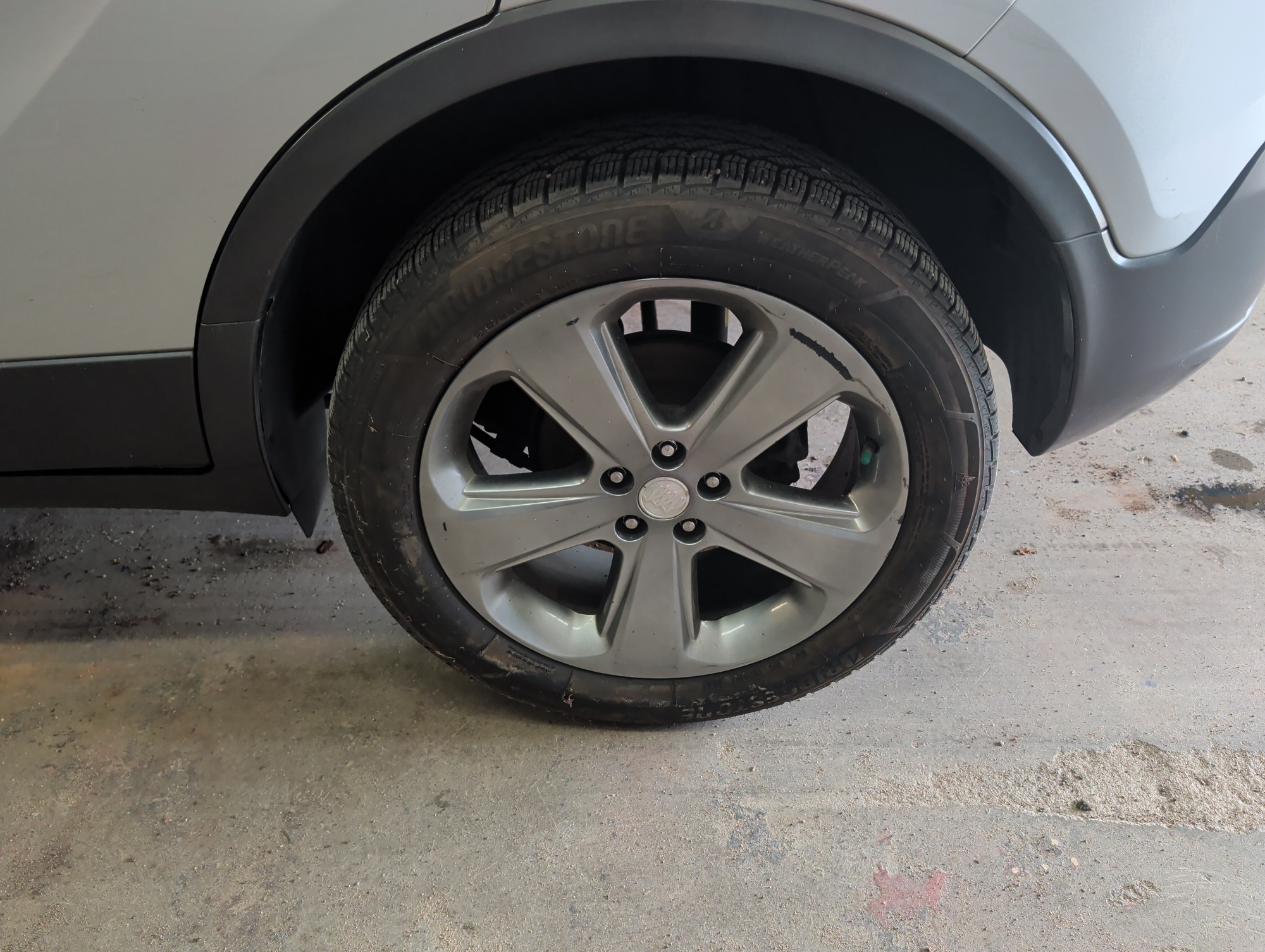 2013 buick encore premium-awd with 117195 miles for sale near elk-river, minnesota 105965_13_rear_drv_wheel.jpg