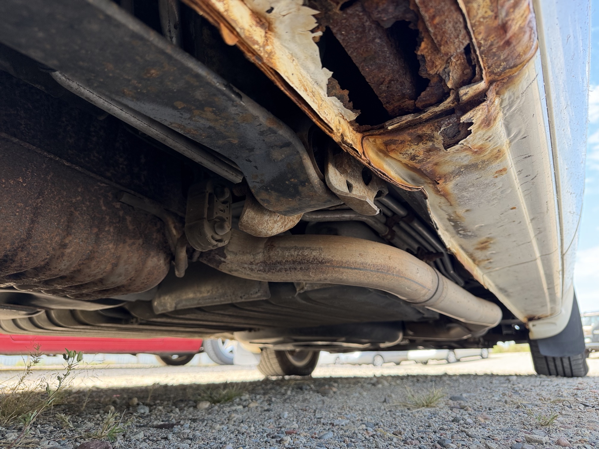 2005 chrysler town-and-country touring with 150988 miles for sale near elk-river, minnesota 106132_20_undercar_rear_pass.jpg