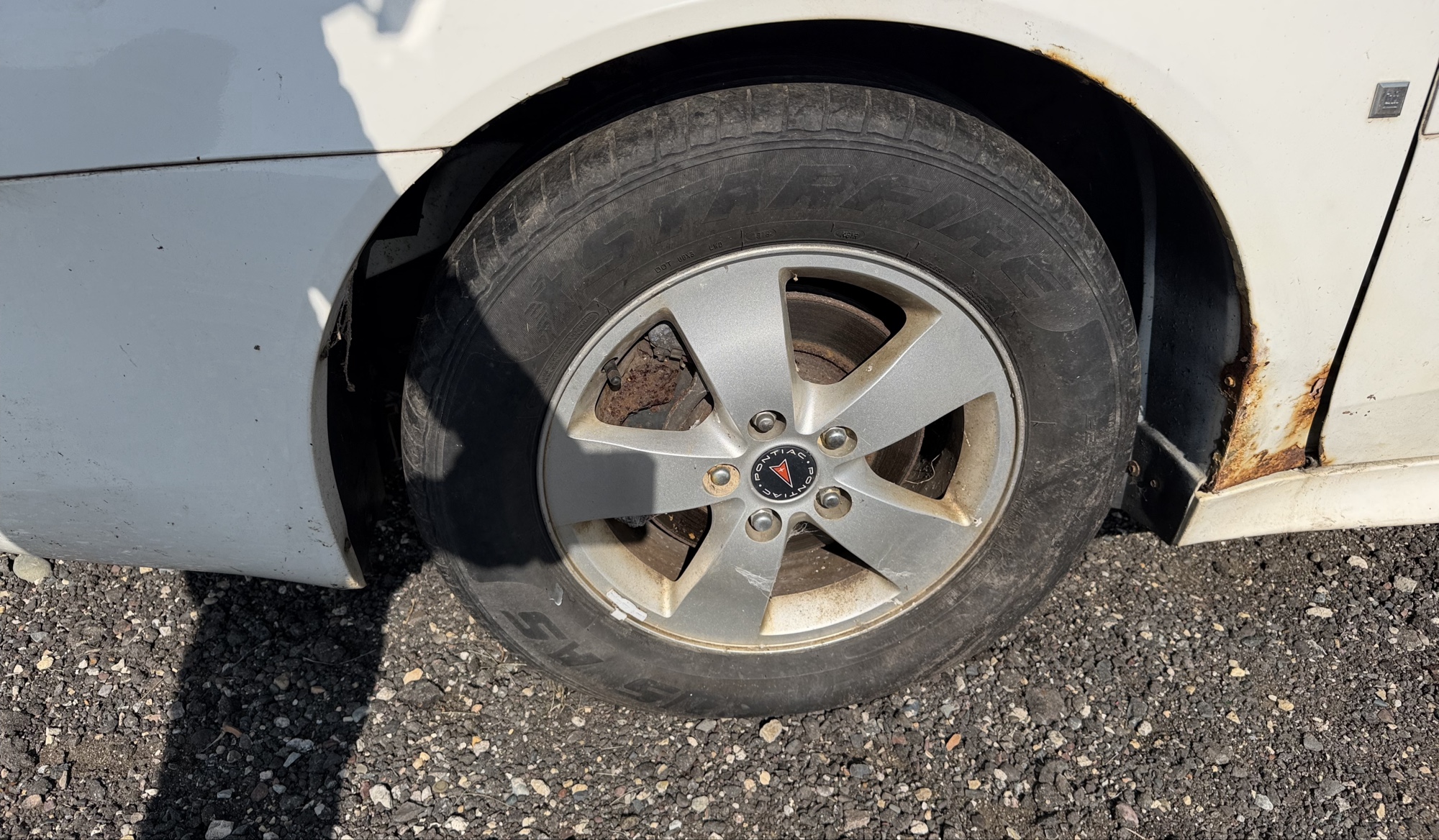 2006 pontiac grand-prix base with 237218 miles for sale near elk-river, minnesota 106150_12_drv_front_wheel.jpg