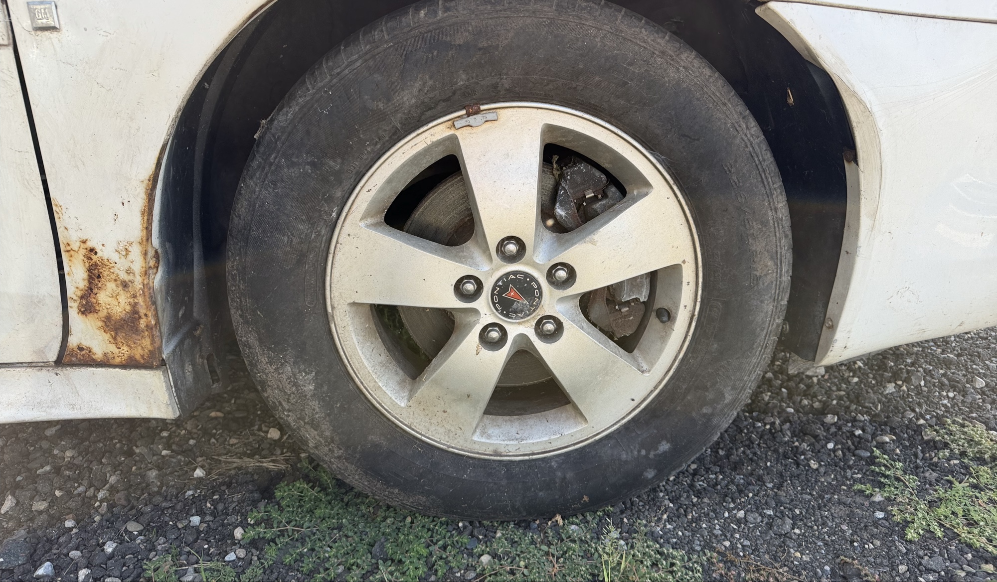 2006 pontiac grand-prix base with 237218 miles for sale near elk-river, minnesota 106150_15_front_pass_wheel.jpg
