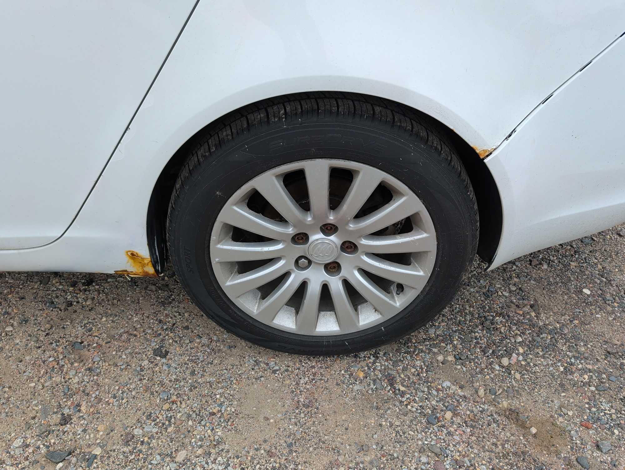 2012 buick regal premium-1 with 301345 miles for sale near elk-river, minnesota 106168_13_rear_drv_wheel.jpg