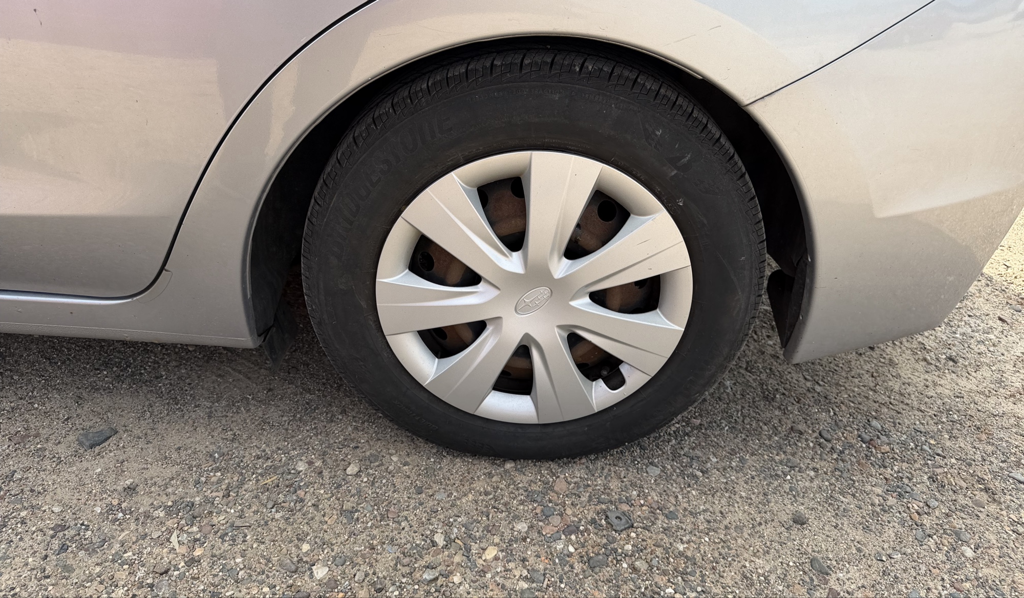 2013 subaru impreza base-5-door with 166153 miles for sale near elk-river, minnesota 106296_13_rear_drv_wheel.jpg