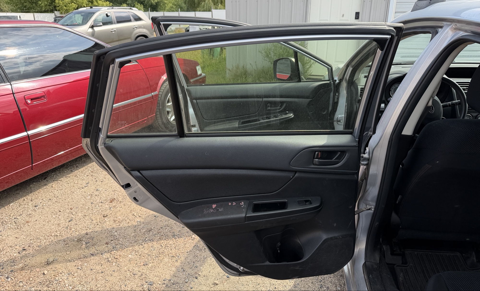 2013 subaru impreza base-5-door with 166153 miles for sale near elk-river, minnesota 106296_25_drv_rear_door_panel.jpg