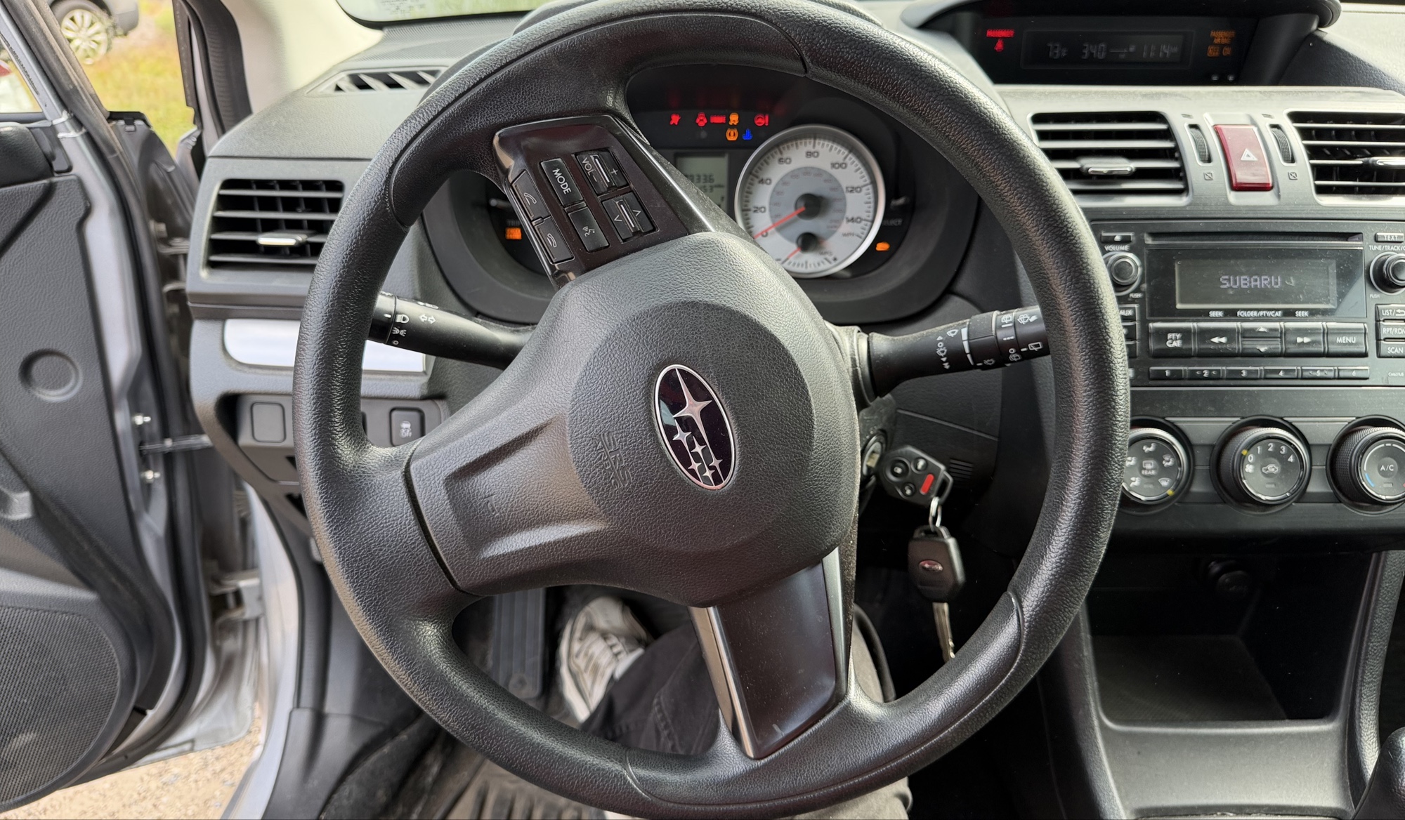 2013 subaru impreza base-5-door with 166153 miles for sale near elk-river, minnesota 106296_36_steering_wheel.jpg