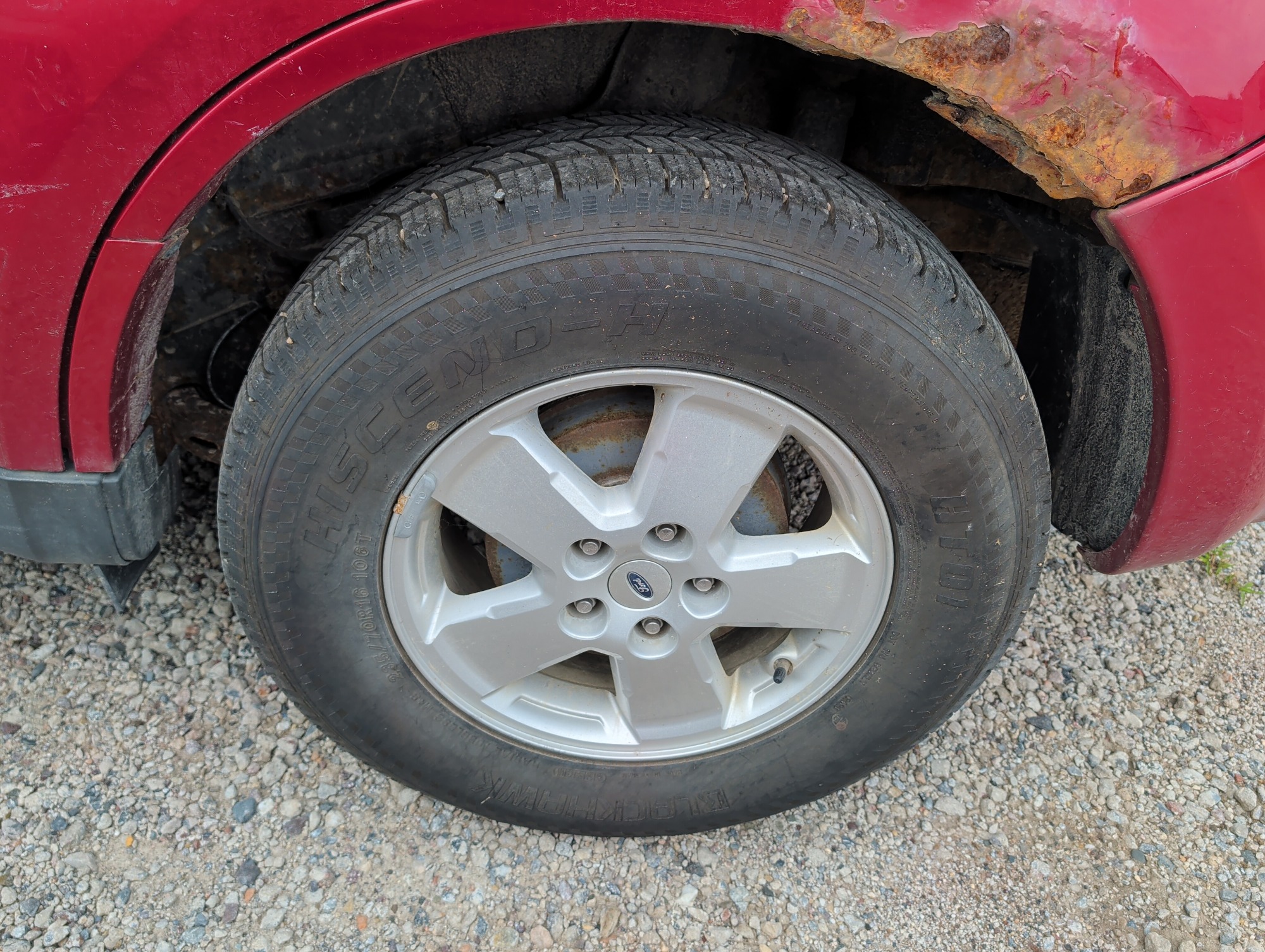 2011 ford escape xlt-fwd with 245967 miles for sale near elk-river, minnesota 106304_13_rear_drv_wheel.jpg