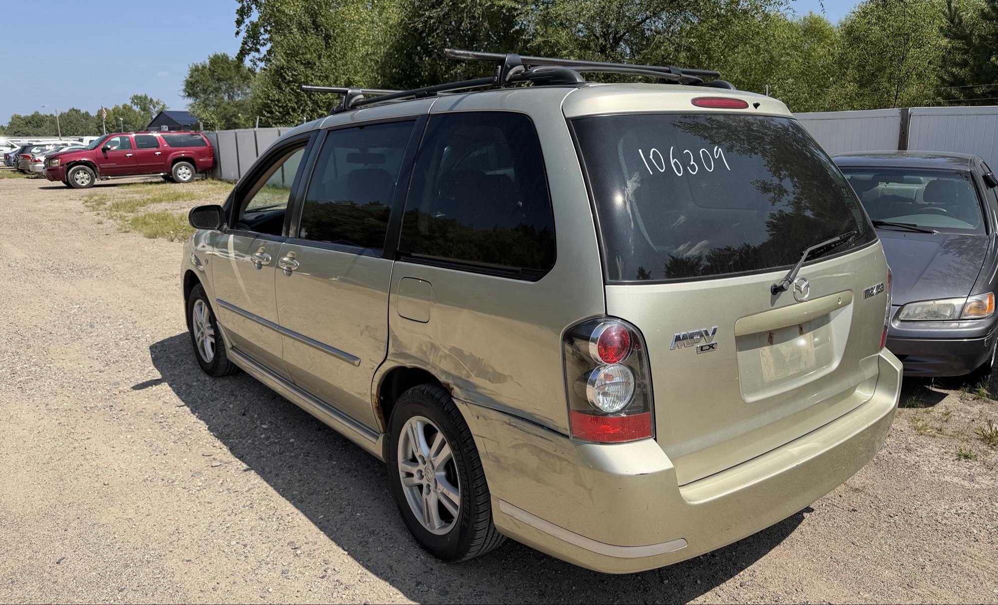 2004 mazda mpv lx with 94040 miles for sale near elk-river, minnesota 106309_03_rear_driver_corner.jpg