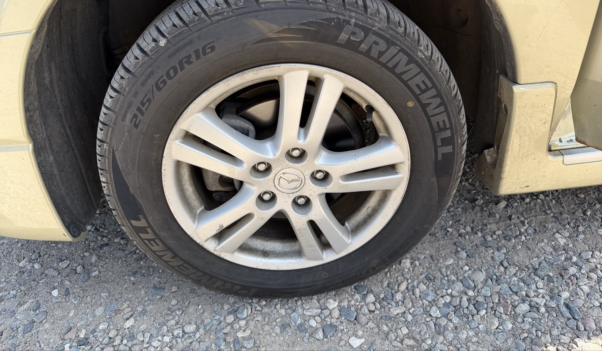 2004 mazda mpv lx with 94040 miles for sale near elk-river, minnesota 106309_12_drv_front_wheel.jpg
