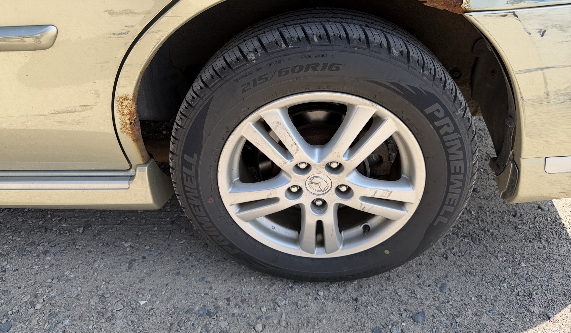 2004 mazda mpv lx with 94040 miles for sale near elk-river, minnesota 106309_13_rear_drv_wheel.jpg