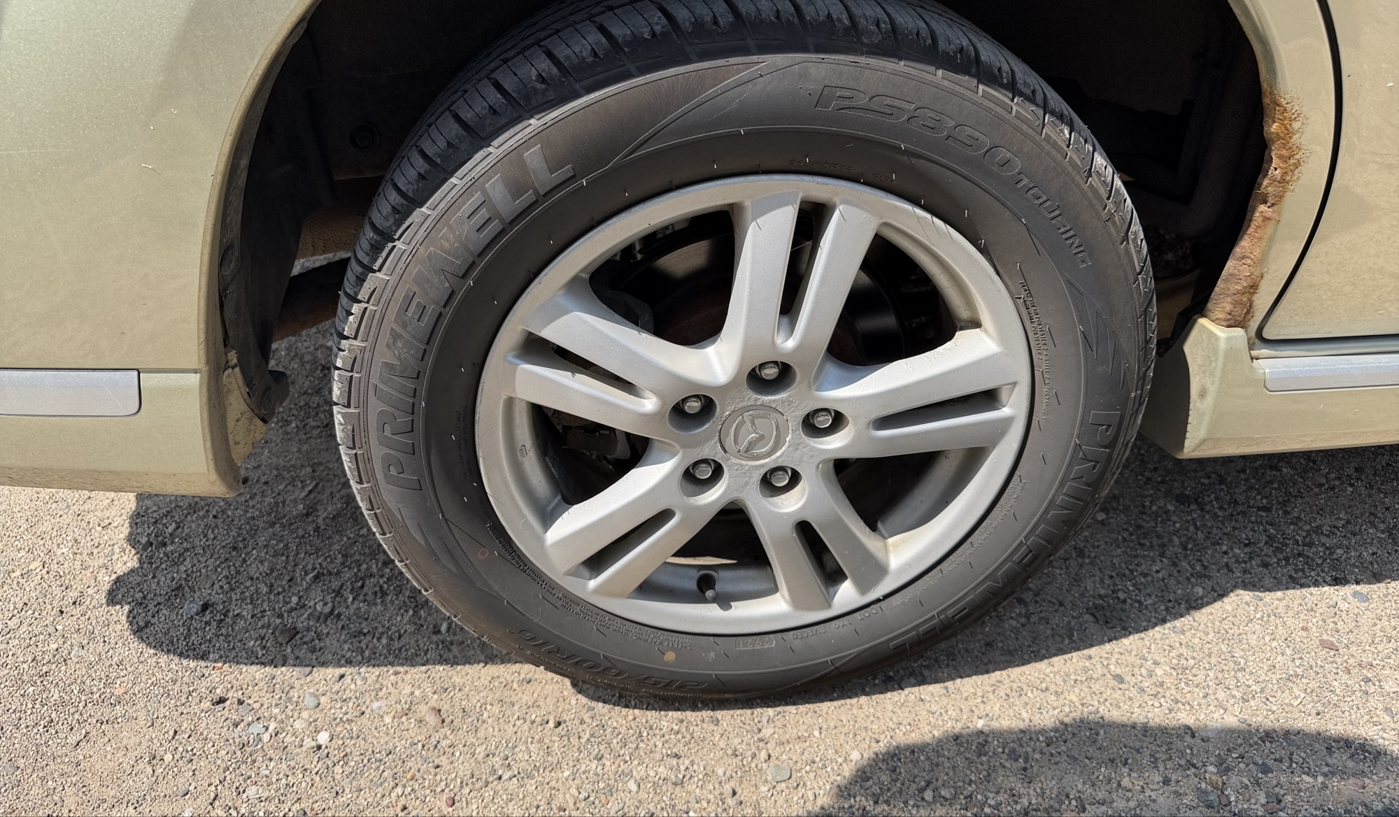 2004 mazda mpv lx with 94040 miles for sale near elk-river, minnesota 106309_14_rear_pass_wheel.jpg