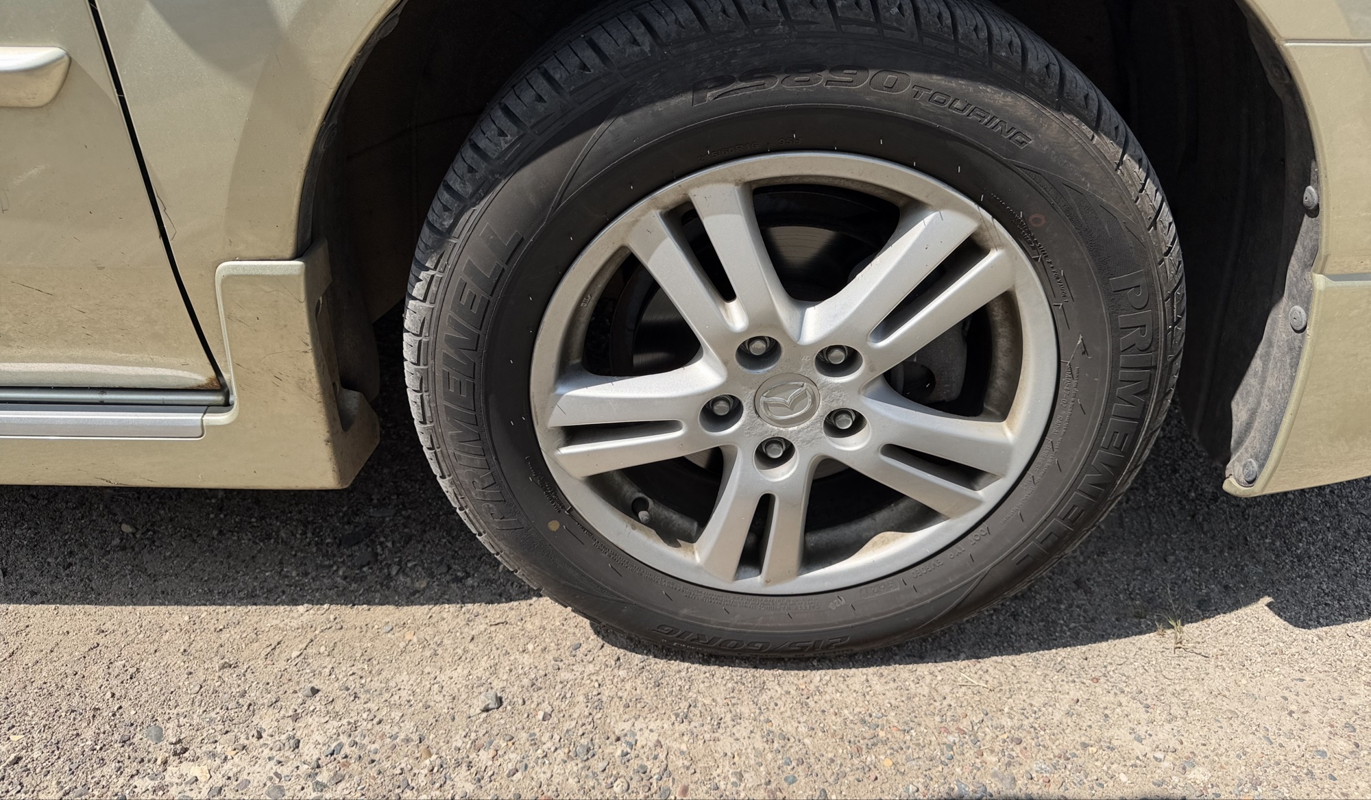2004 mazda mpv lx with 94040 miles for sale near elk-river, minnesota 106309_15_front_pass_wheel.jpg