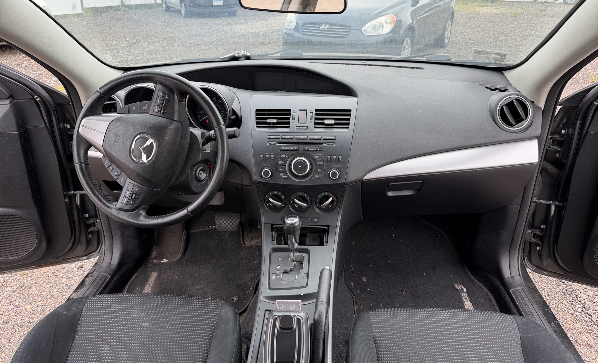 2012 mazda mazda3 i-touring-4-door with 105844 miles for sale near elk-river, minnesota 106316_34_whole_dash.jpg