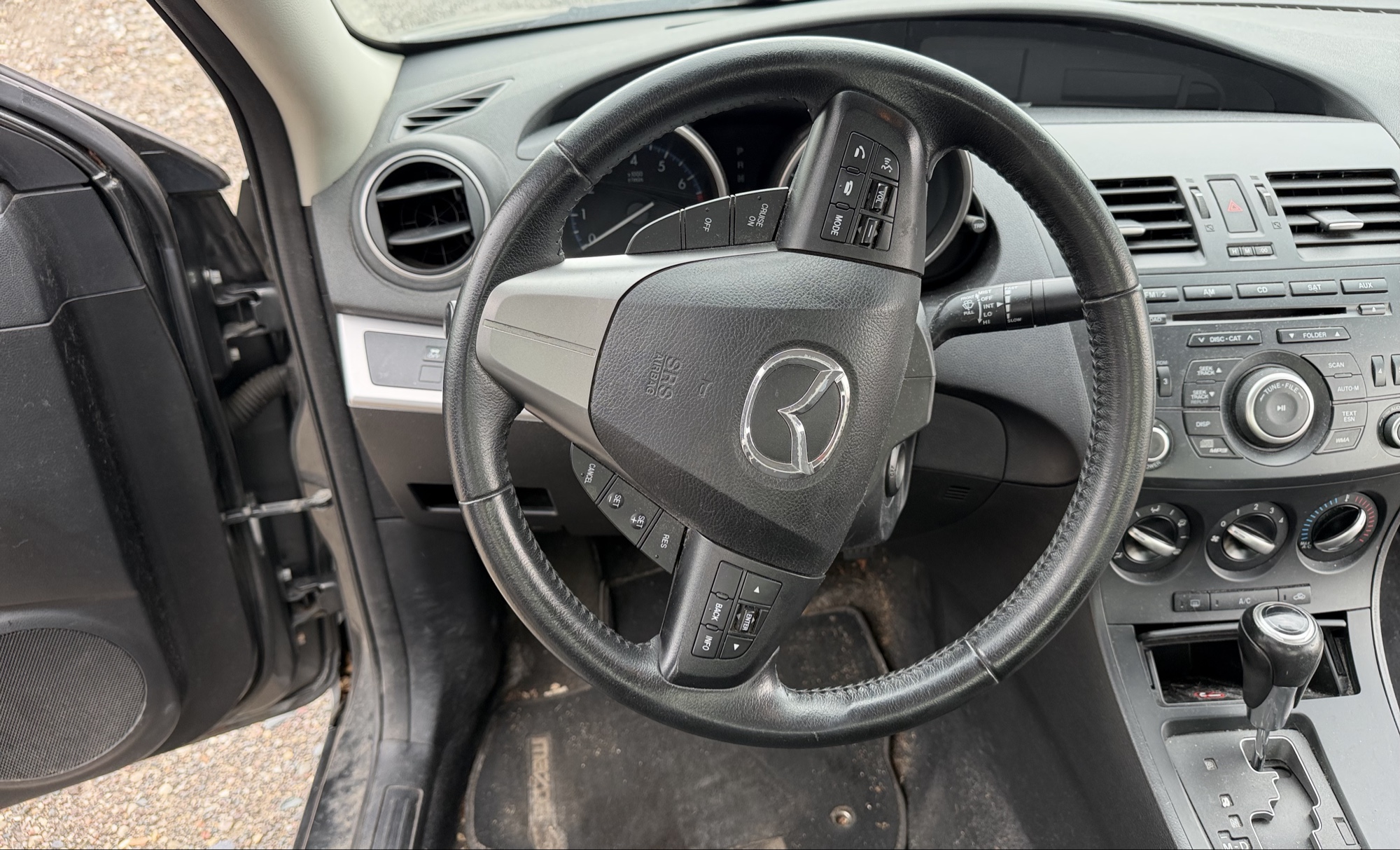 2012 mazda mazda3 i-touring-4-door with 105844 miles for sale near elk-river, minnesota 106316_36_steering_wheel.jpg