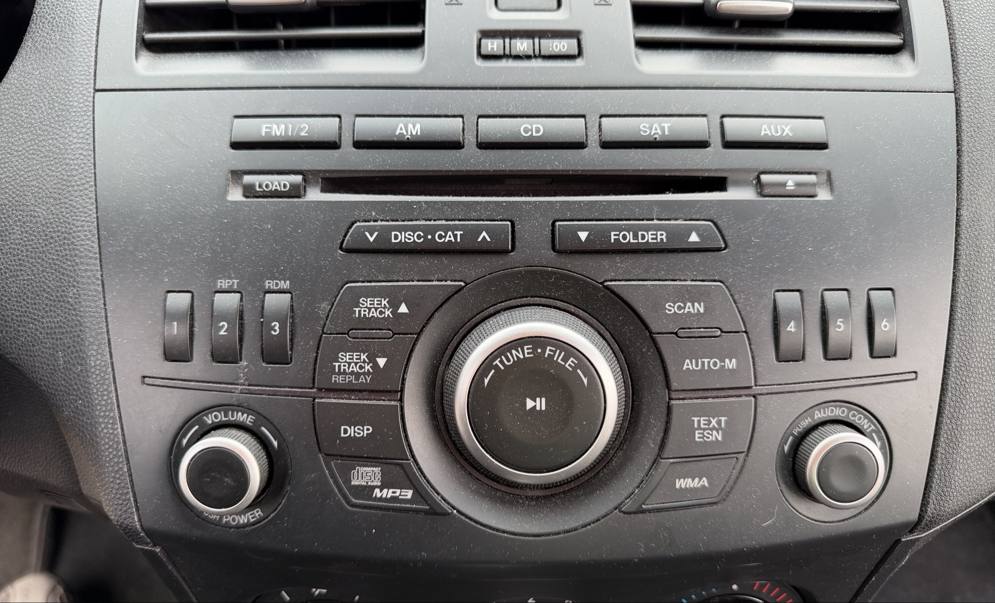 2012 mazda mazda3 i-touring-4-door with 105844 miles for sale near elk-river, minnesota 106316_39_radio_closeup.jpg