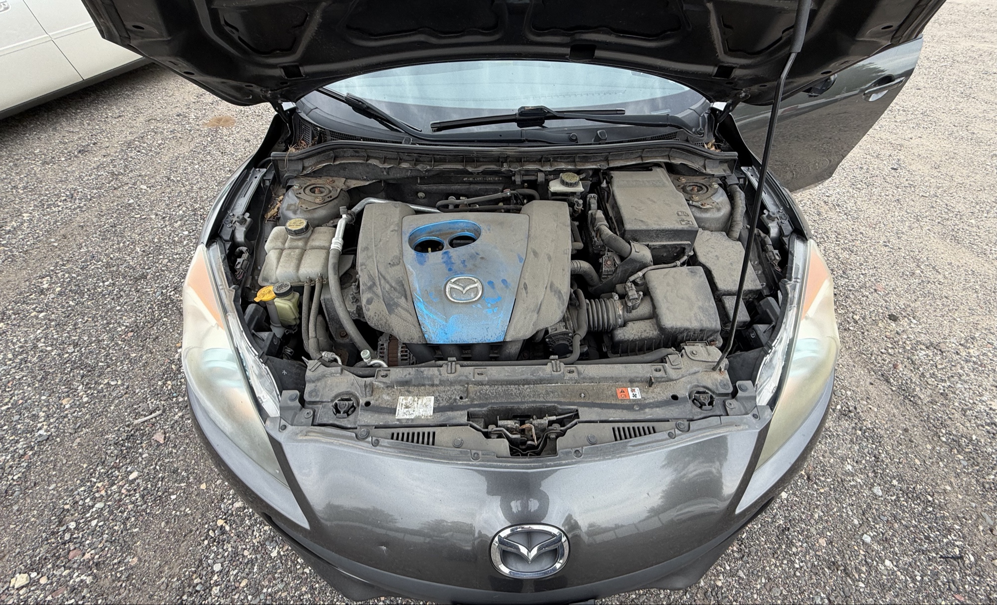 2012 mazda mazda3 i-touring-4-door with 105844 miles for sale near elk-river, minnesota 106316_49_engine_bay.jpg