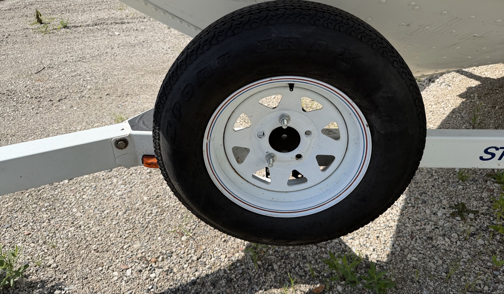 1995 starcraft- tourneyfish- - for sale near elk-river, minnesota 106317_12_drv_front_wheel.jpg
