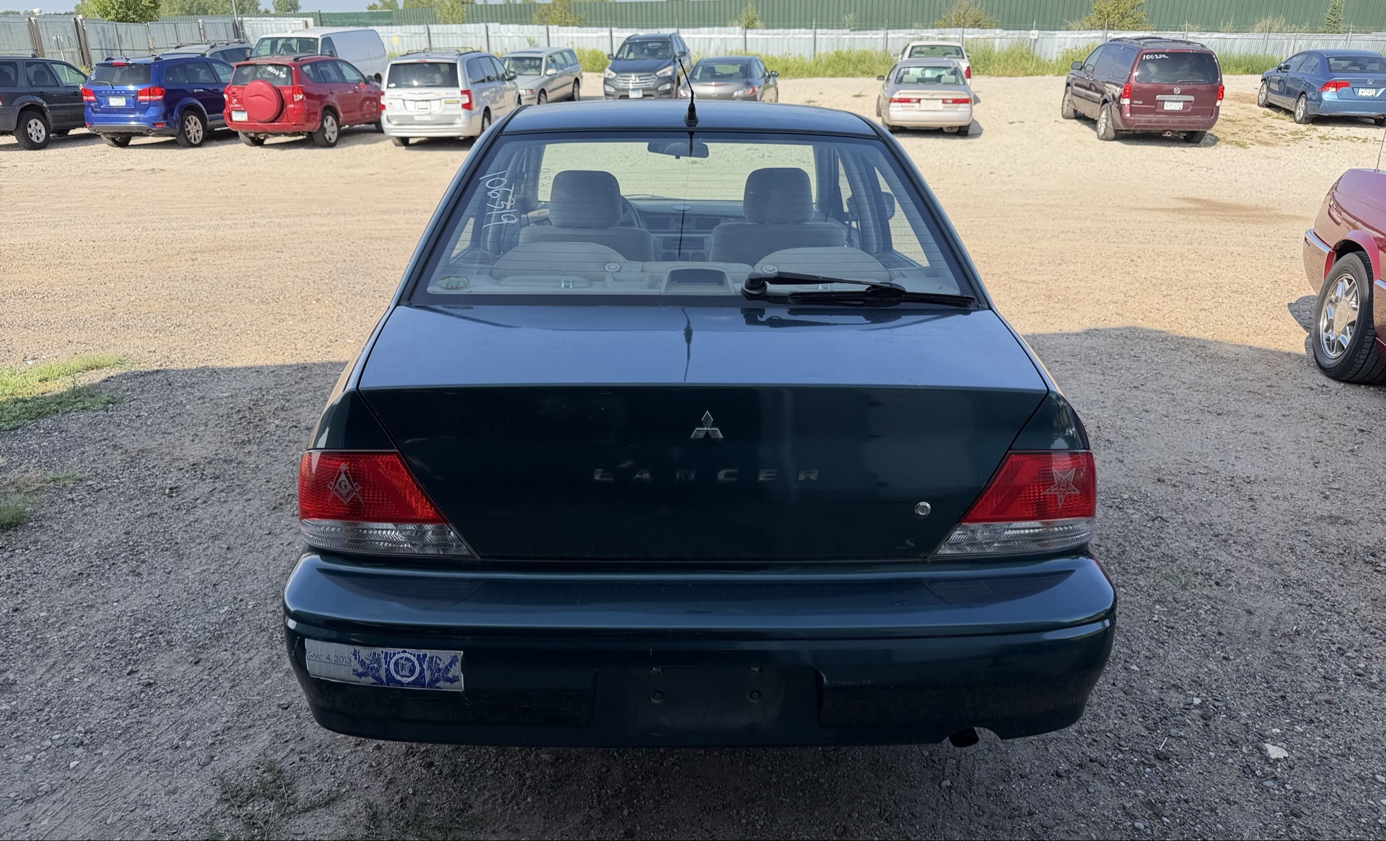 2002 mitsubishi lancer base with 166691 miles for sale near elk-river, minnesota 106319_04_rear_end.jpg