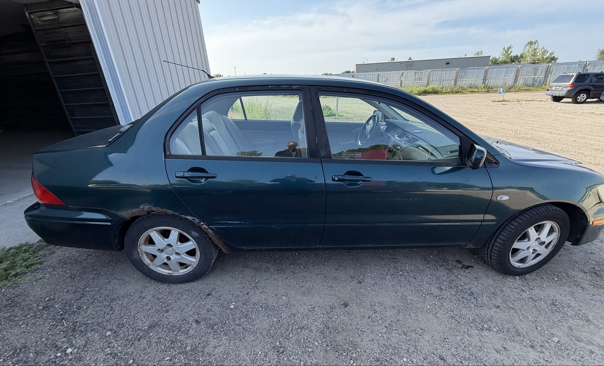 2002 mitsubishi lancer base with 166691 miles for sale near elk-river, minnesota 106319_06_pass_side.jpg