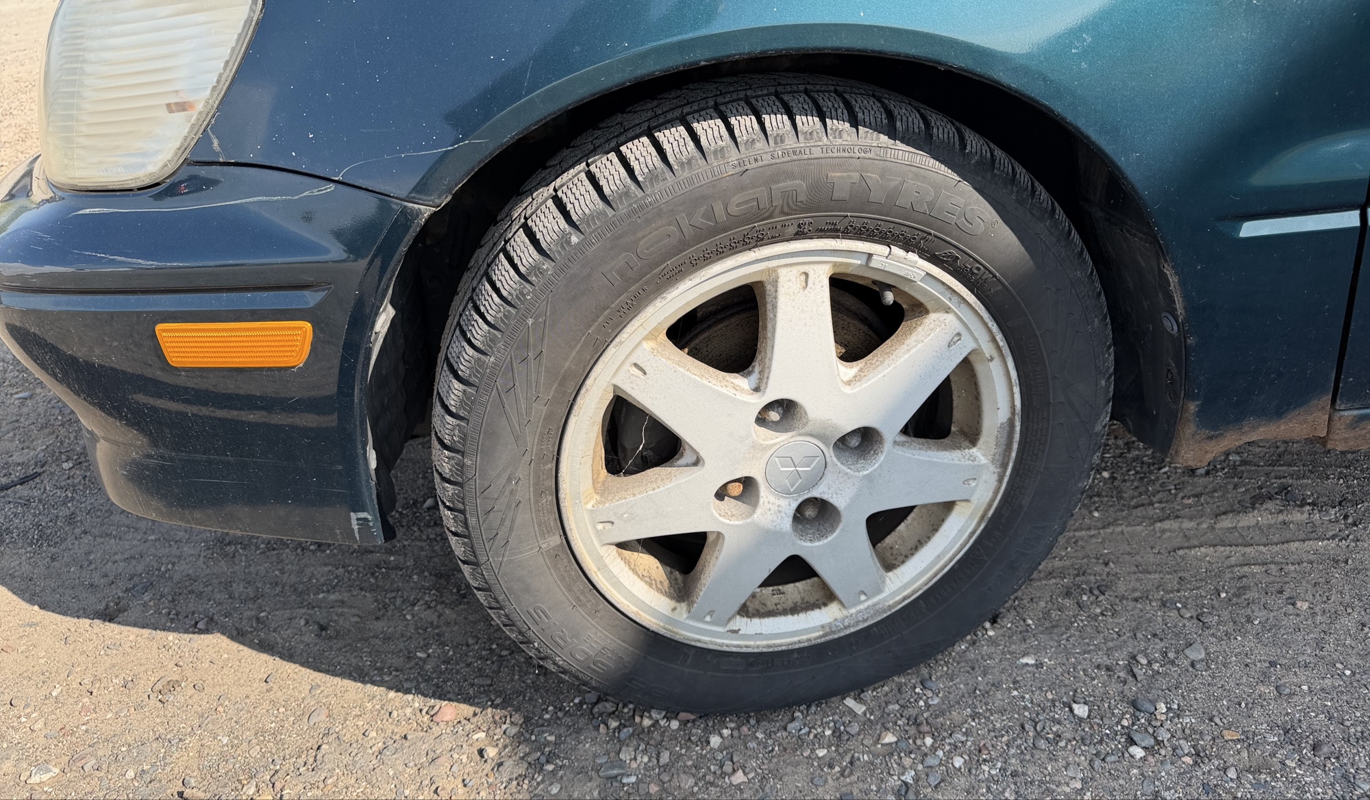 2002 mitsubishi lancer base with 166691 miles for sale near elk-river, minnesota 106319_12_drv_front_wheel.jpg