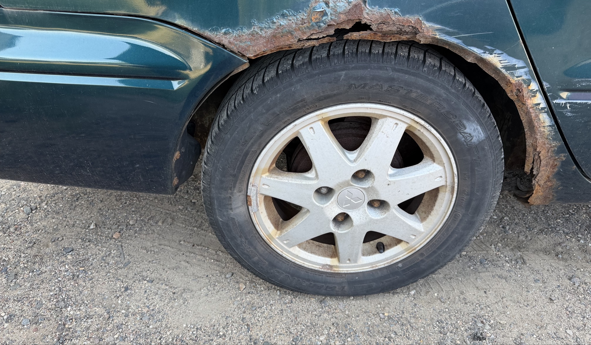 2002 mitsubishi lancer base with 166691 miles for sale near elk-river, minnesota 106319_14_rear_pass_wheel.jpg