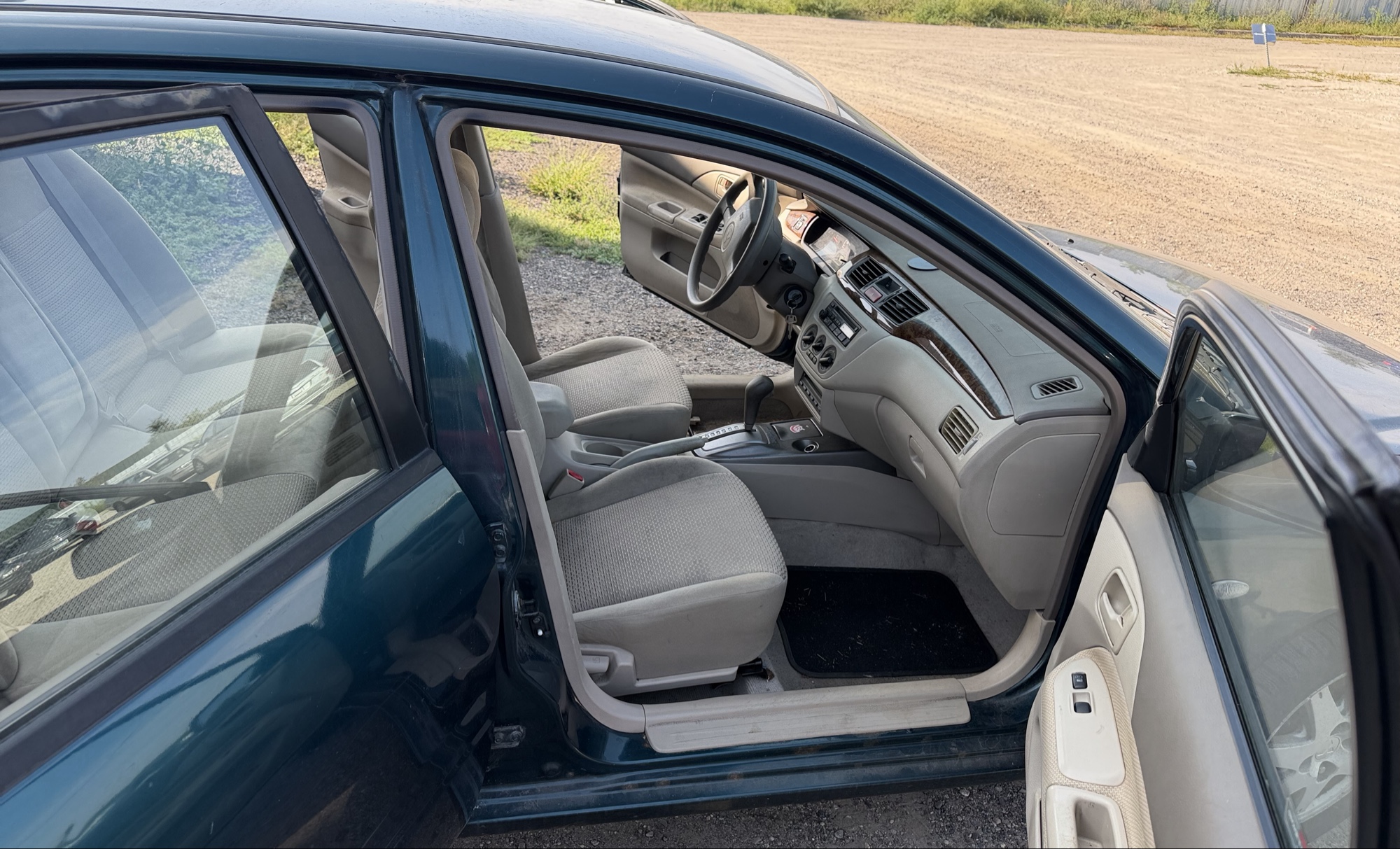 2002 mitsubishi lancer base with 166691 miles for sale near elk-river, minnesota 106319_31_passenger_seat.jpg