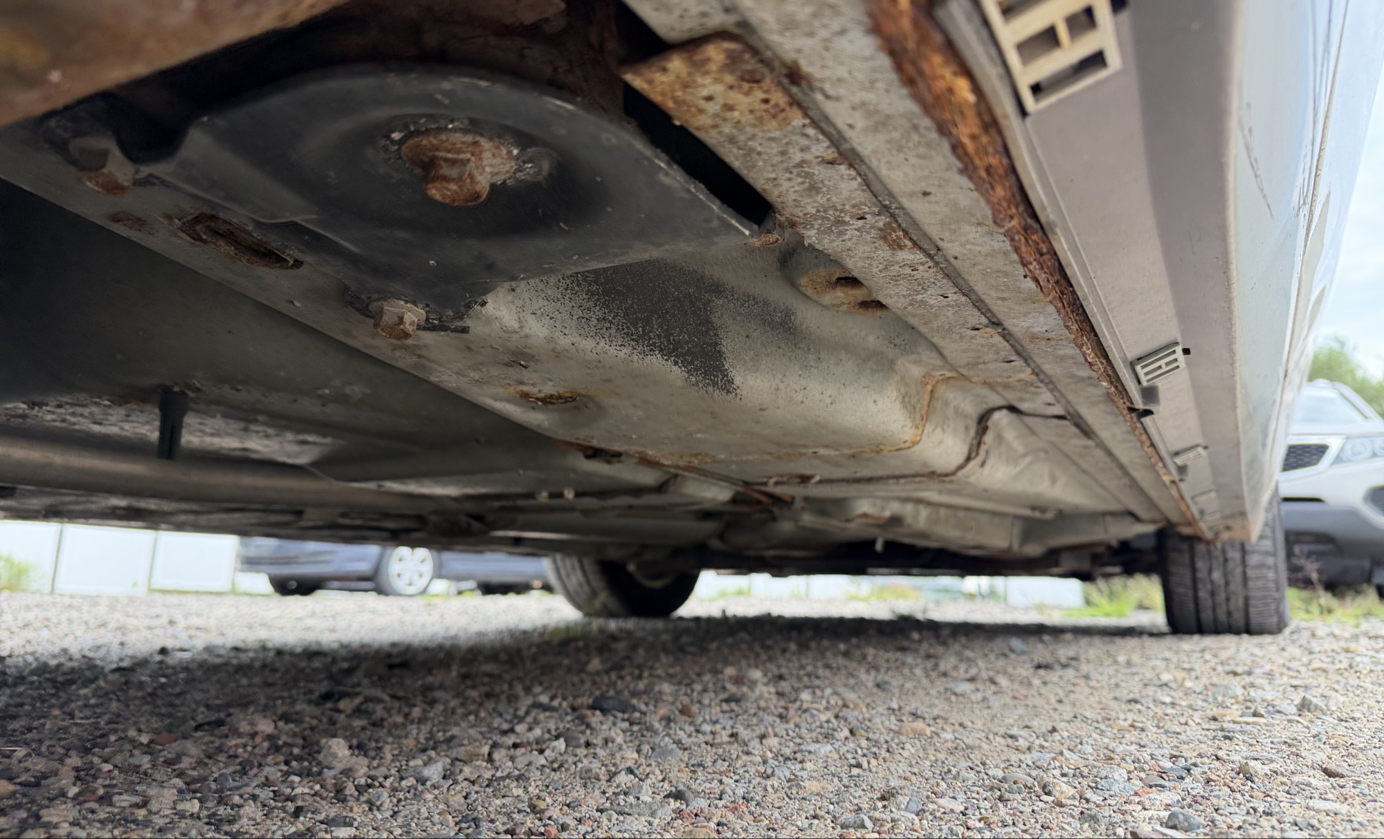 2000 cadillac deville dhs with 89472 miles for sale near elk-river, minnesota 106320_20_undercar_rear_pass.jpg