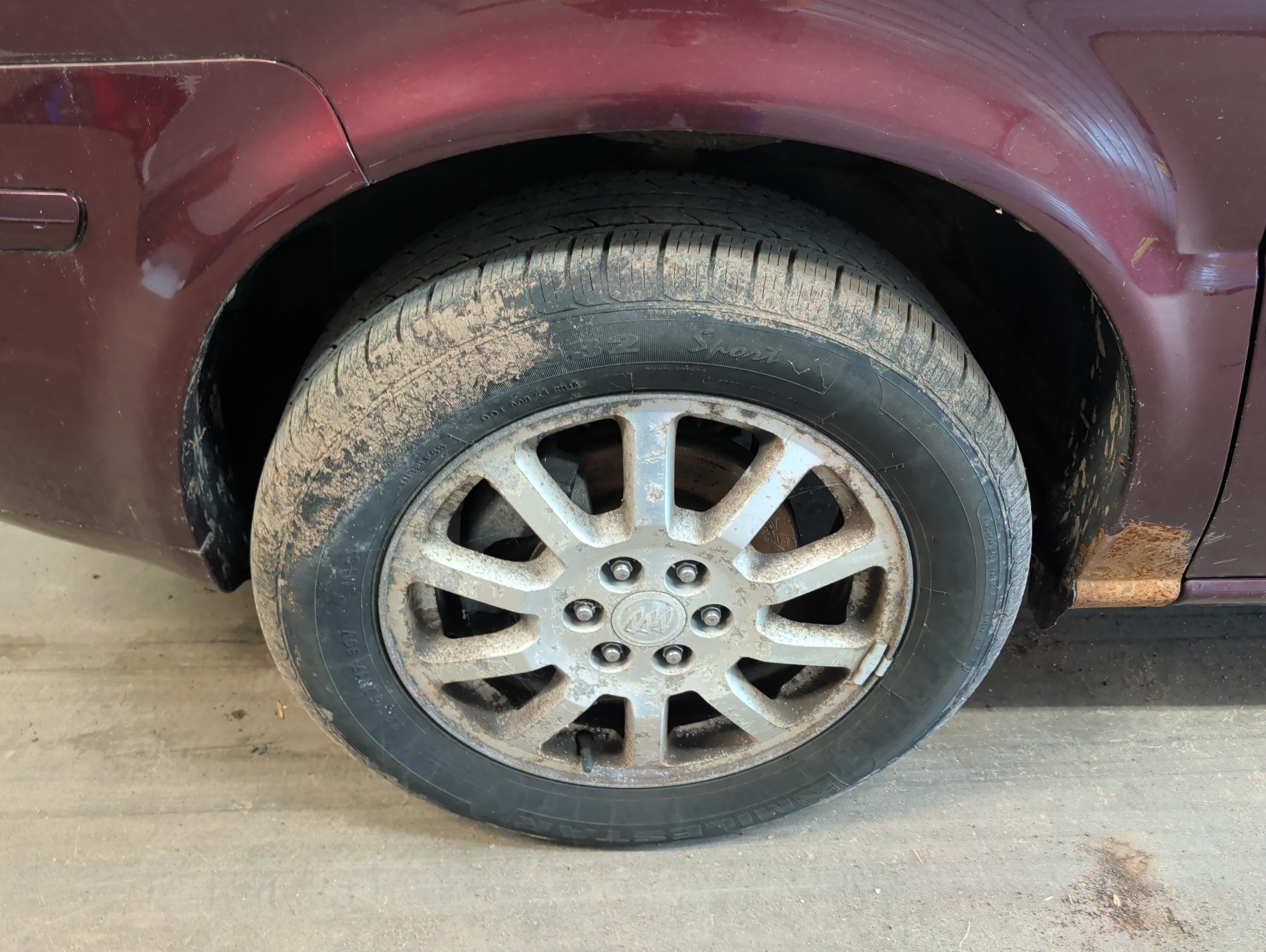 2006 buick terraza cx with 241067 miles for sale near elk-river, minnesota 106322_12_drv_front_wheel.jpg