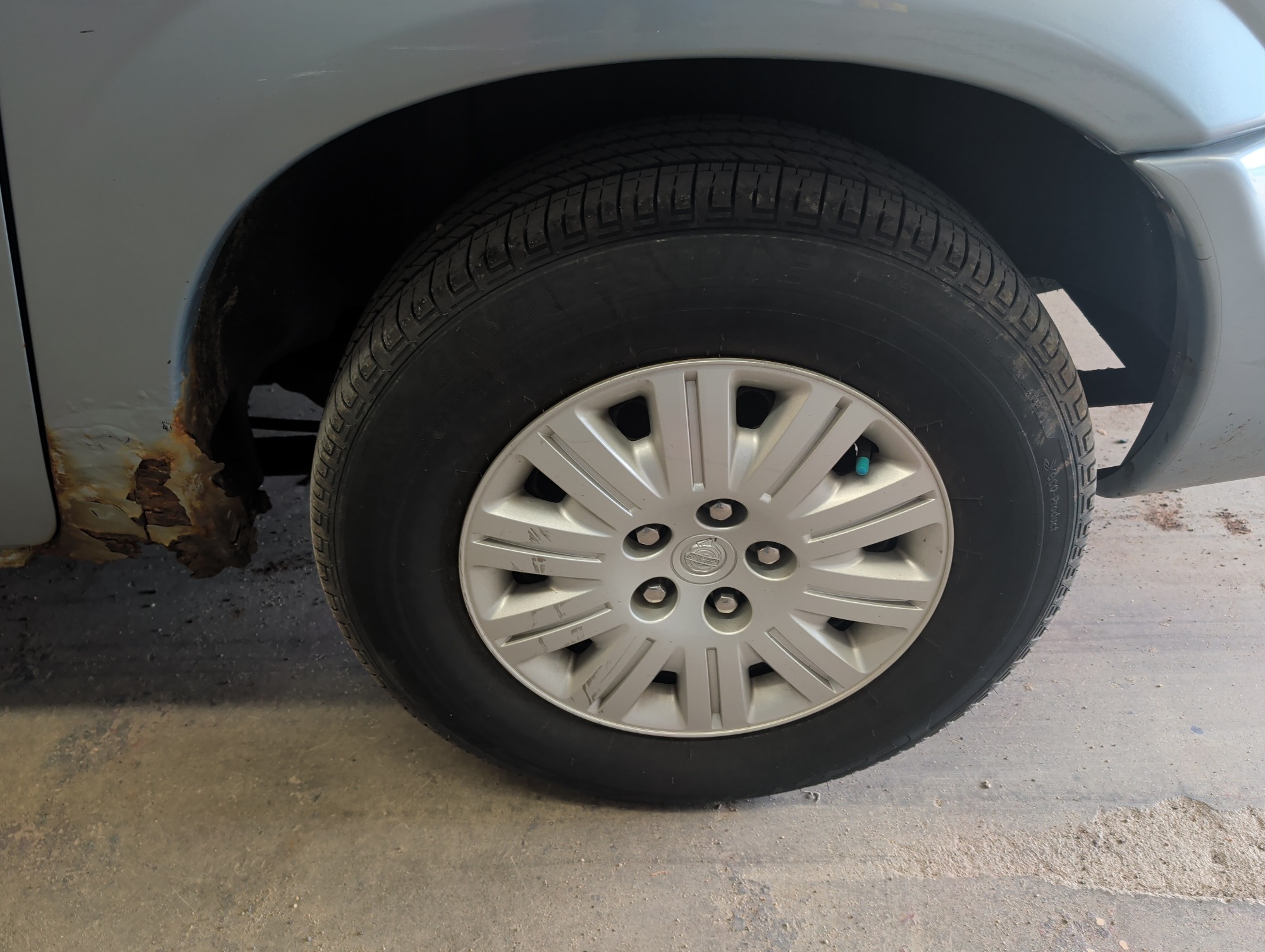 2005 chrysler town-&amp;-country lx with 164706 miles for sale near elk-river, minnesota 106323_13_rear_drv_wheel.jpg