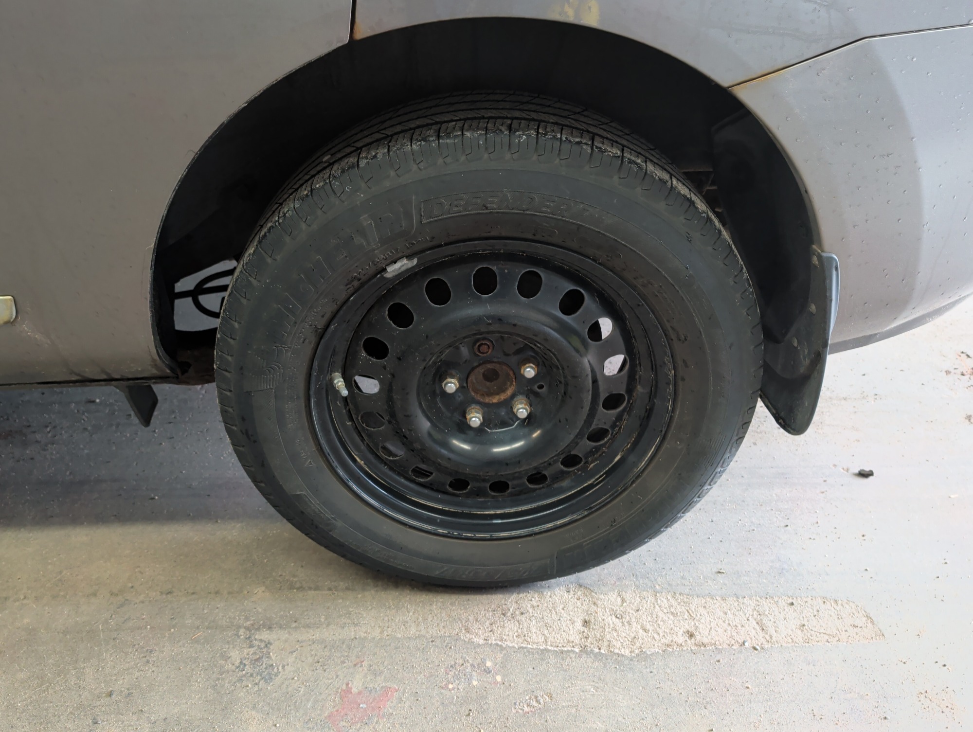 2013 nissan rogue s-2wd with 204423 miles for sale near elk-river, minnesota 106324_13_rear_drv_wheel.jpg