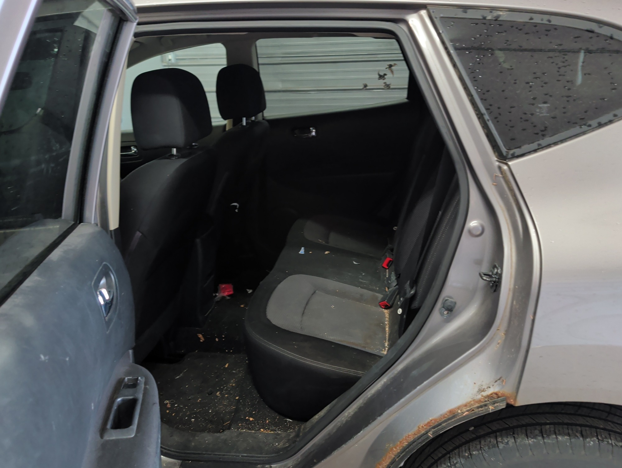 2013 nissan rogue s-2wd with 204423 miles for sale near elk-river, minnesota 106324_24_drv_rear_seat.jpg