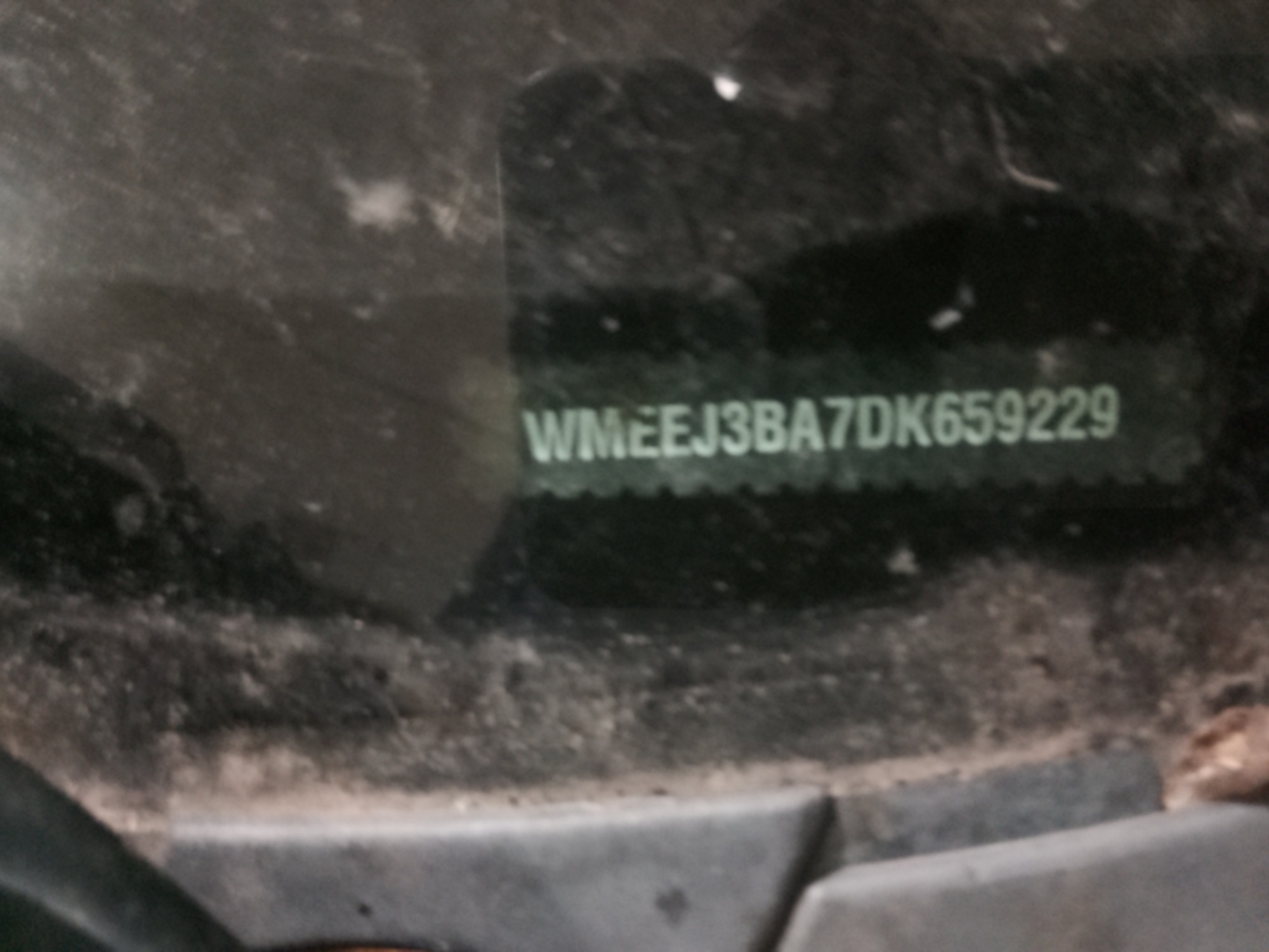 2013 smart fortwo passion with 64568 miles for sale near elk-river, minnesota 106333_48_windshield_vin_plate.jpg