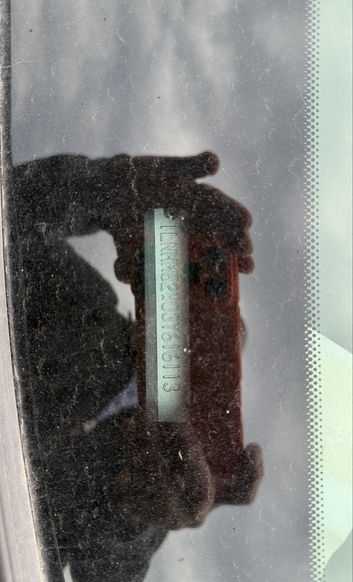 2003 lincoln town-car signature with 110292 miles for sale near elk-river, minnesota 106334_48_windshield_vin_plate.jpg