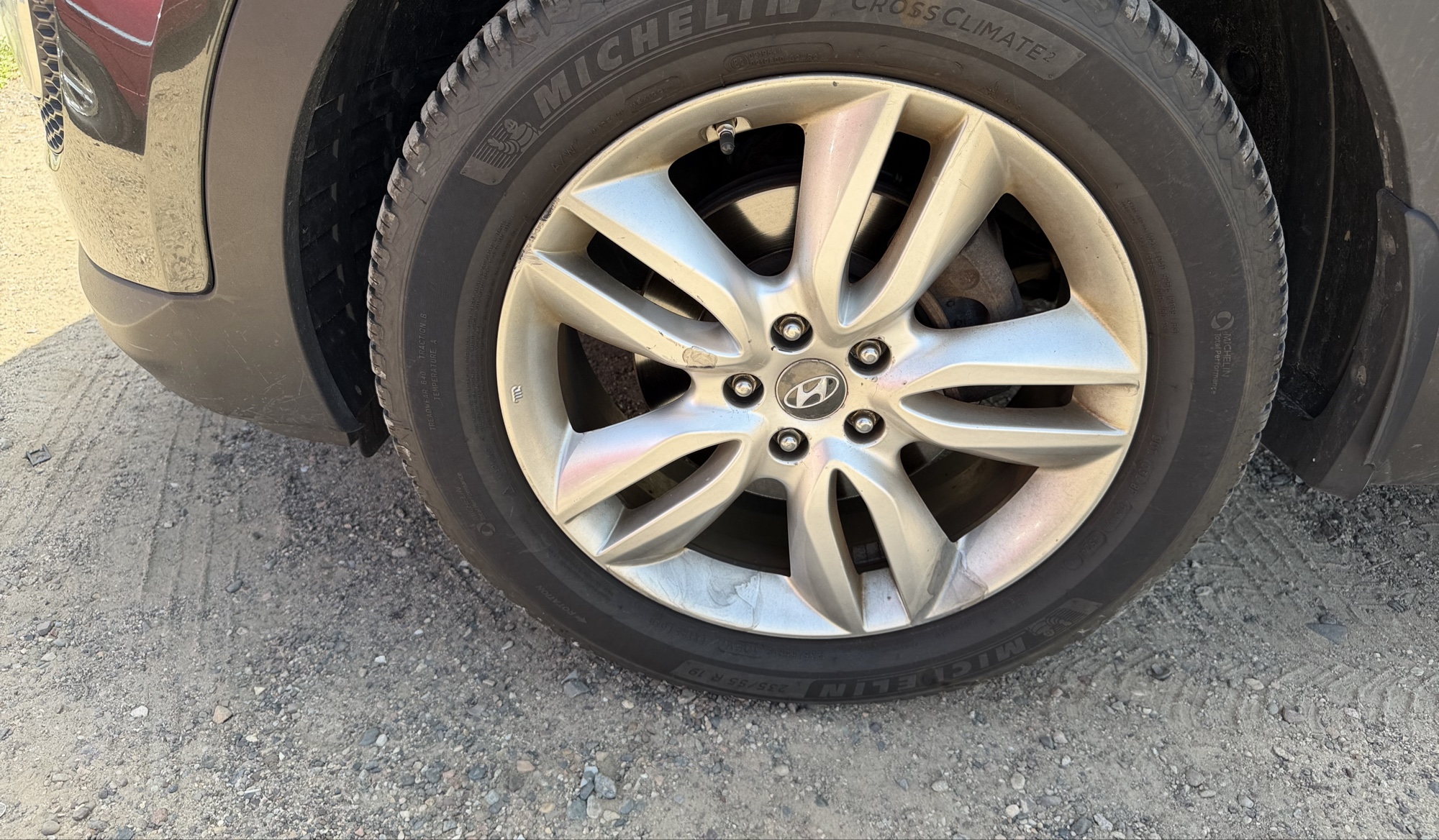 2013 hyundai santa-fe sport-2.0-awd with 164239 miles for sale near elk-river, minnesota 106336_12_drv_front_wheel.jpg