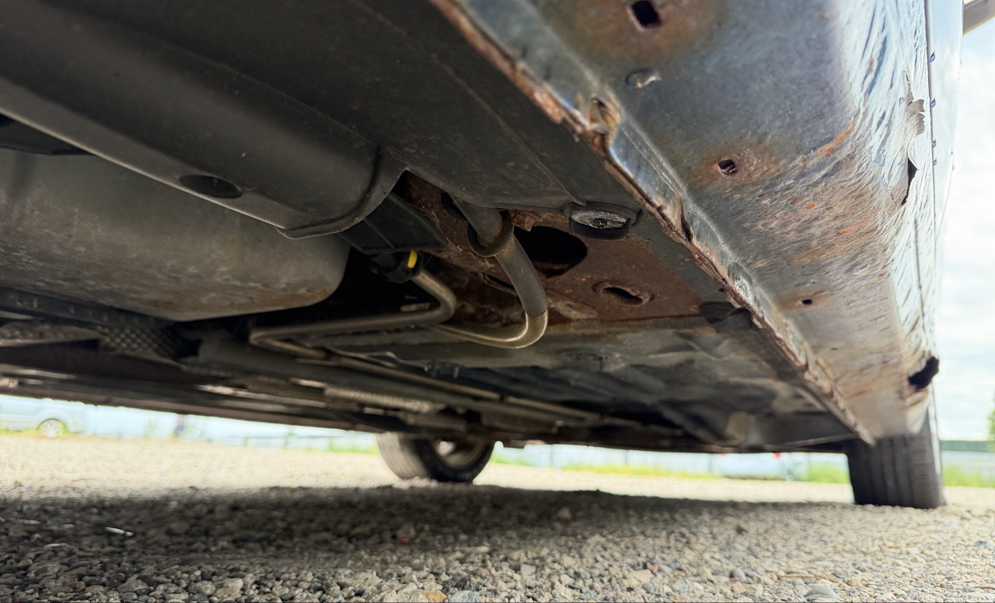 2010 ford focus se-sedan with 110880 miles for sale near elk-river, minnesota 106344_20_undercar_rear_pass.jpg