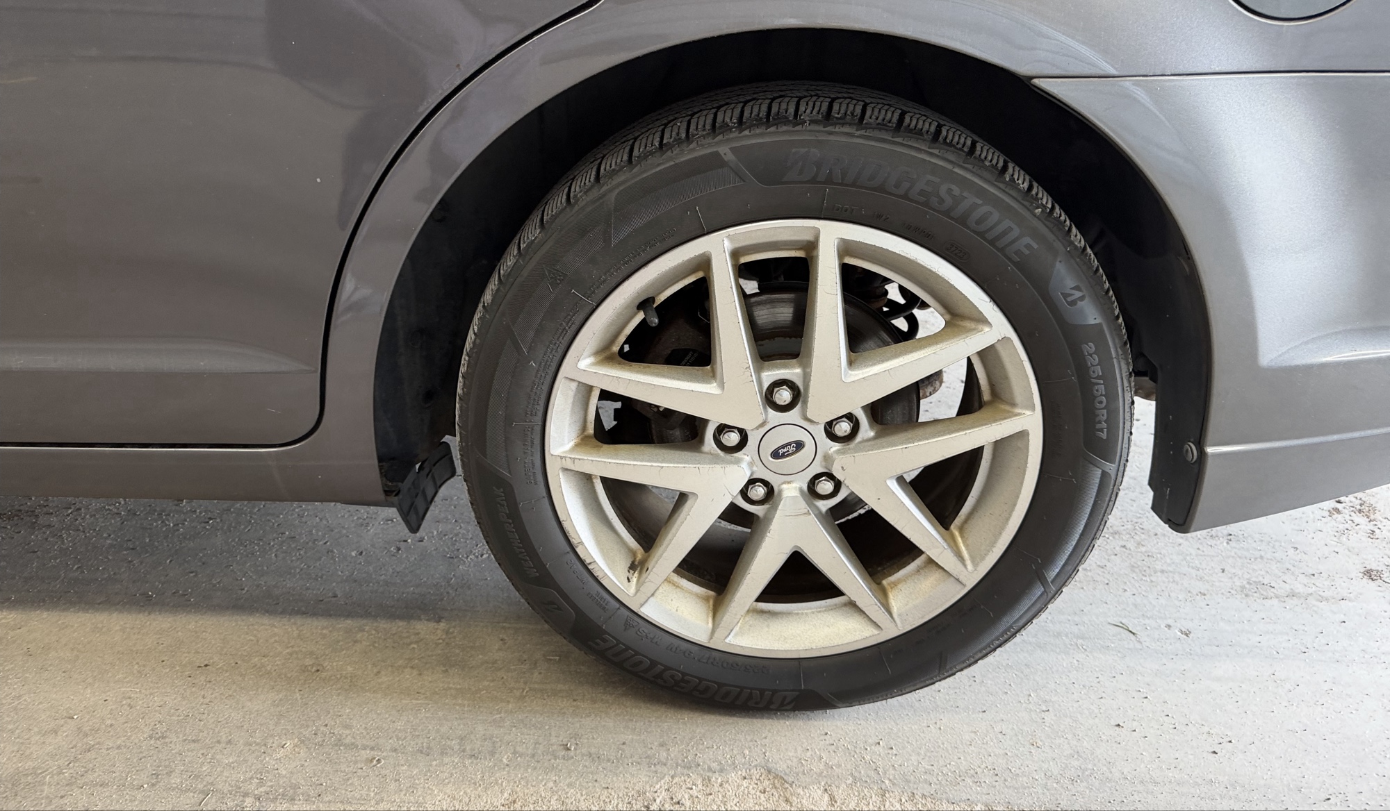 2012 ford fusion sel-awd with 208271 miles for sale near elk-river, minnesota 106354_13_rear_drv_wheel.jpg