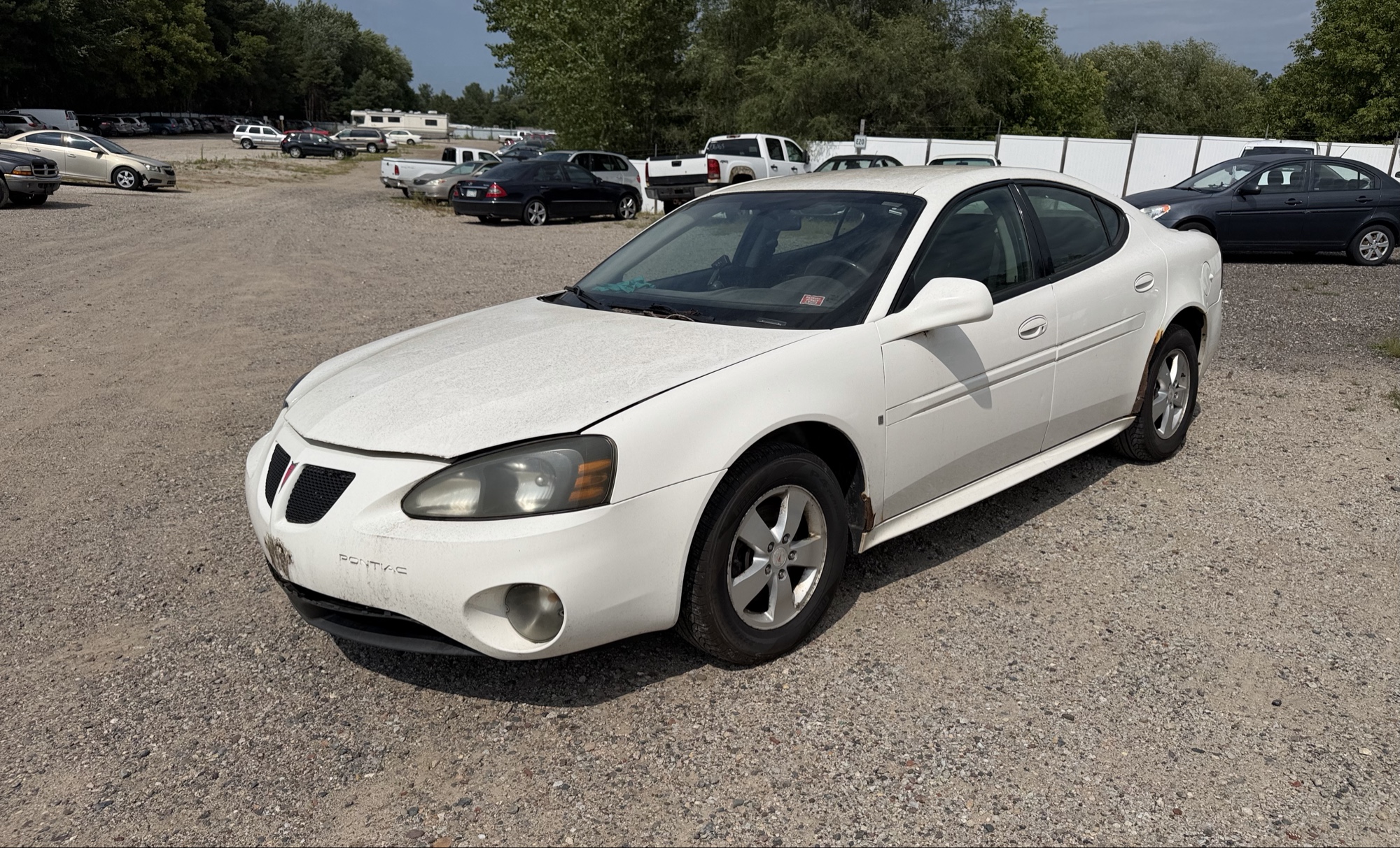2008 pontiac grand-prix sedan with 118916 miles for sale near elk-river, minnesota 106356_01_driver_front_corner.jpg