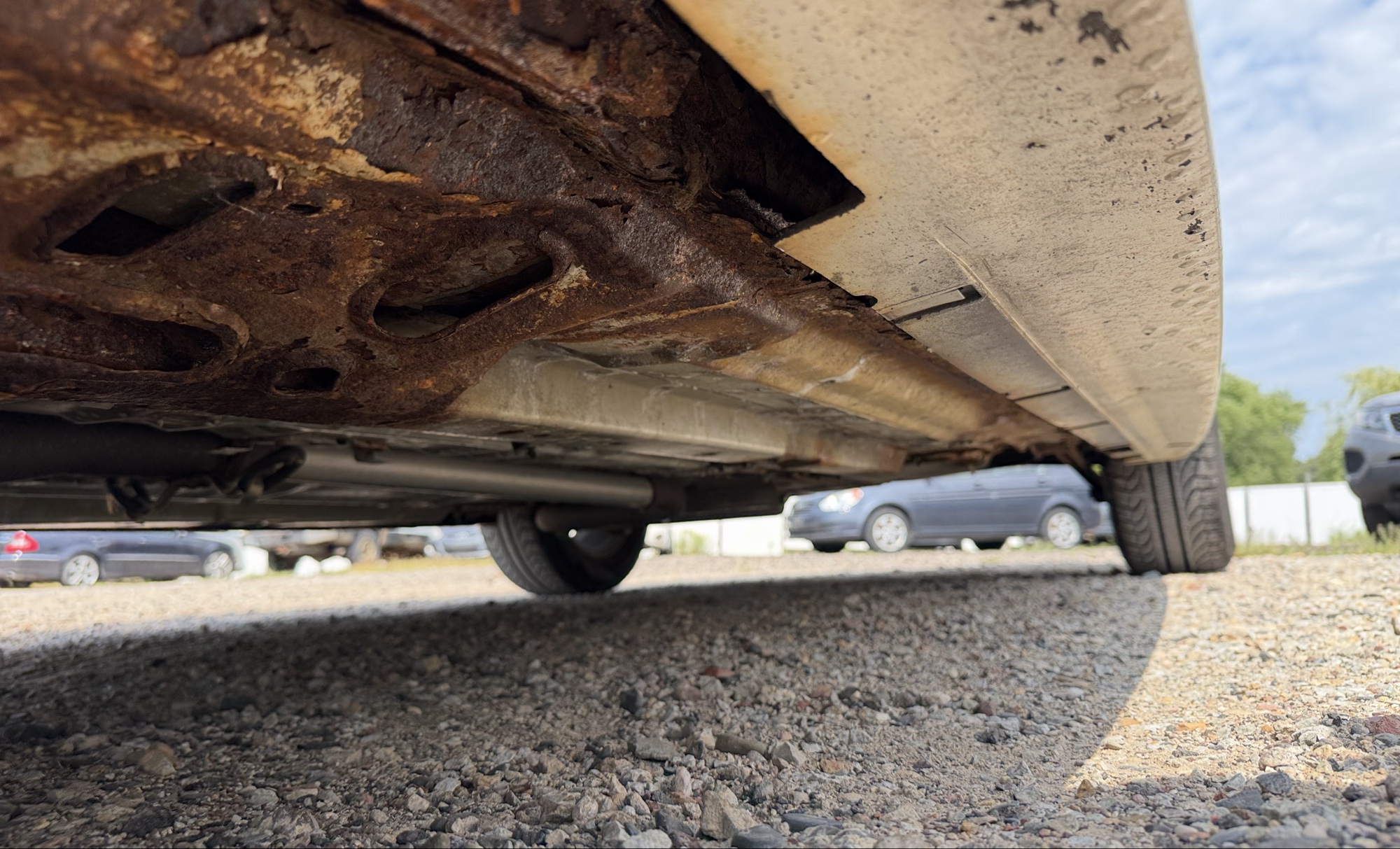 2008 pontiac grand-prix sedan with 118916 miles for sale near elk-river, minnesota 106356_17_undercar_drv_side.jpg