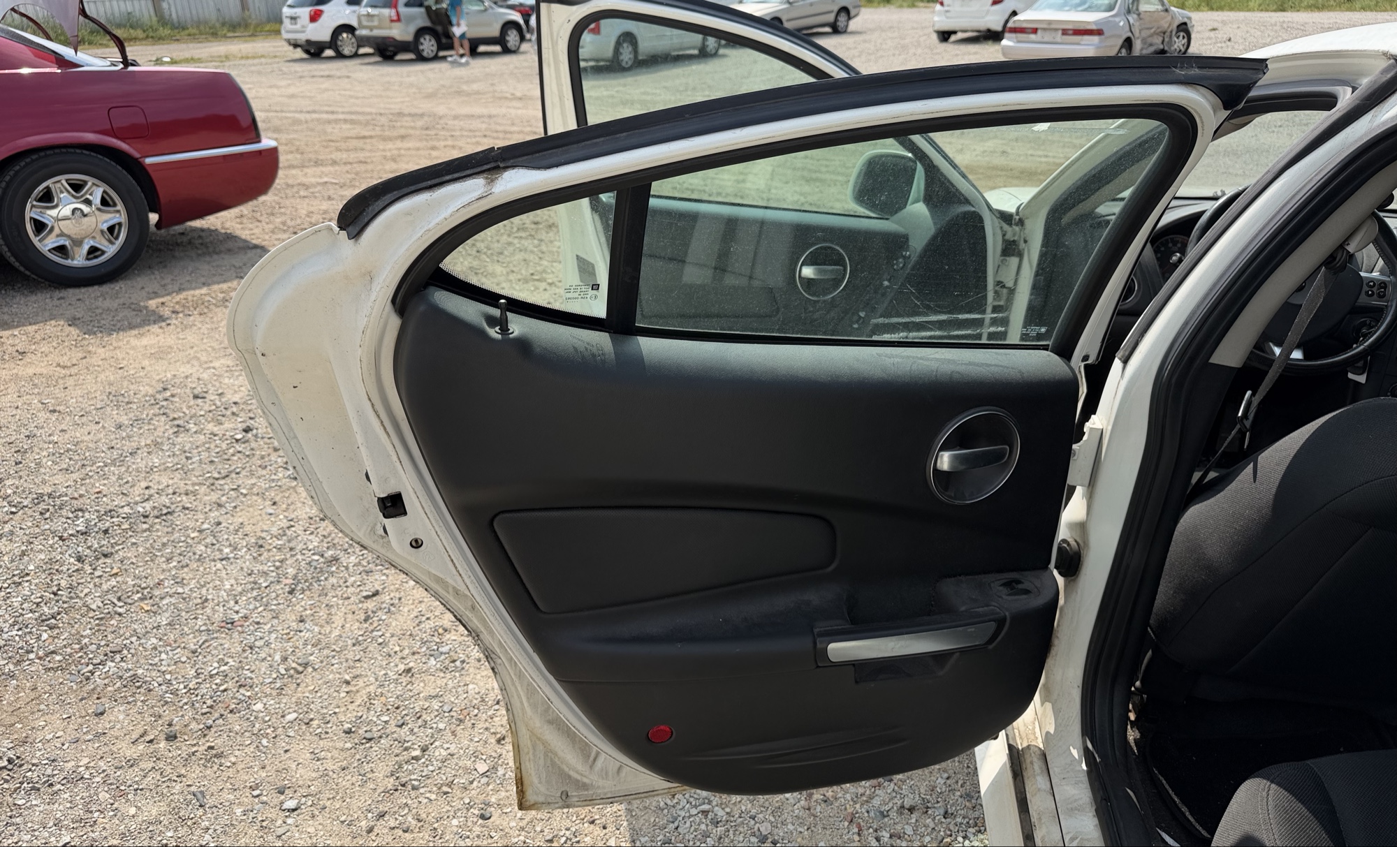 2008 pontiac grand-prix sedan with 118916 miles for sale near elk-river, minnesota 106356_25_drv_rear_door_panel.jpg