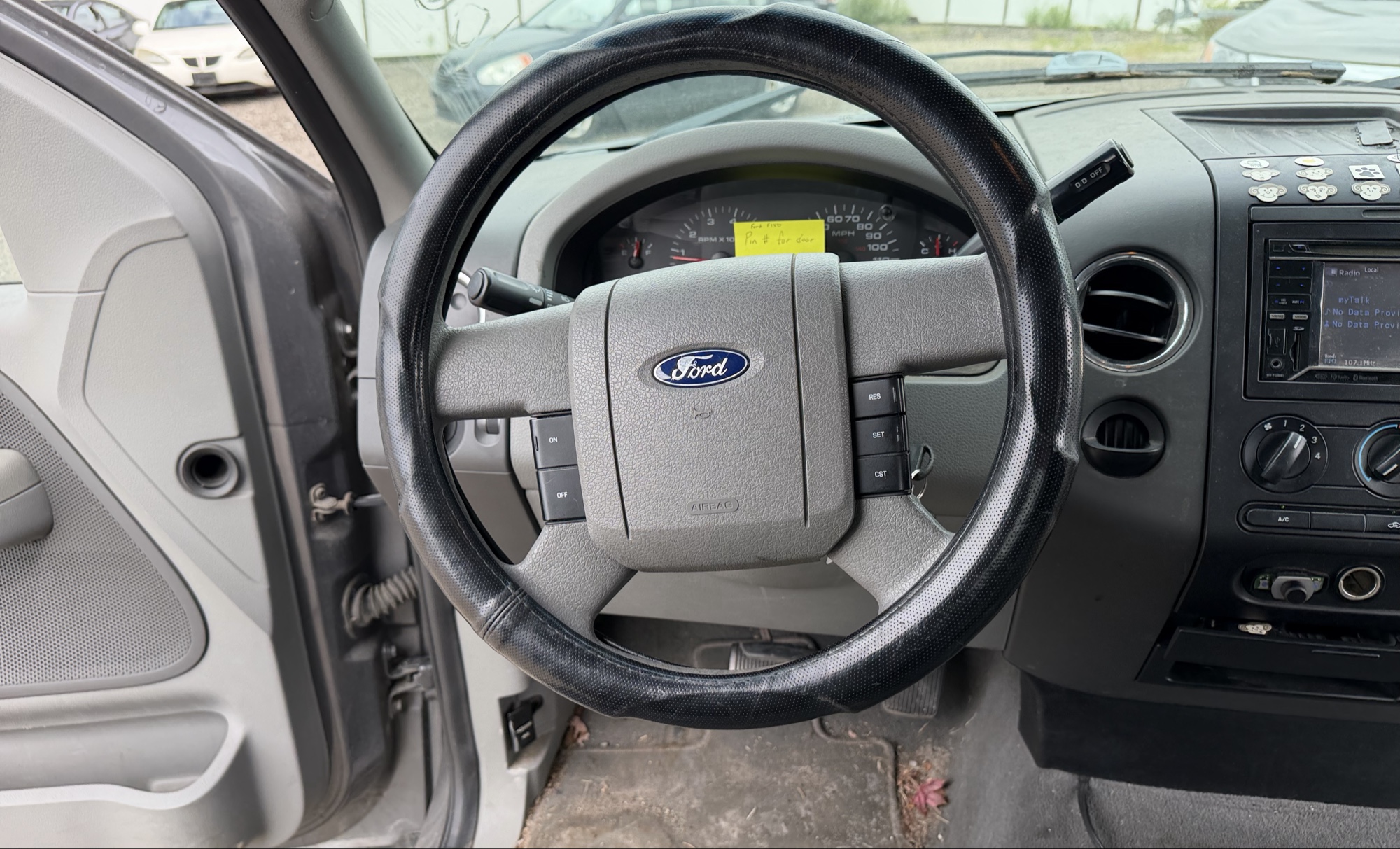 2004 ford f-150 xlt-supercab-5.5-ft-box-2wd with 192068 miles for sale near elk-river, minnesota 106357_36_steering_wheel.jpg