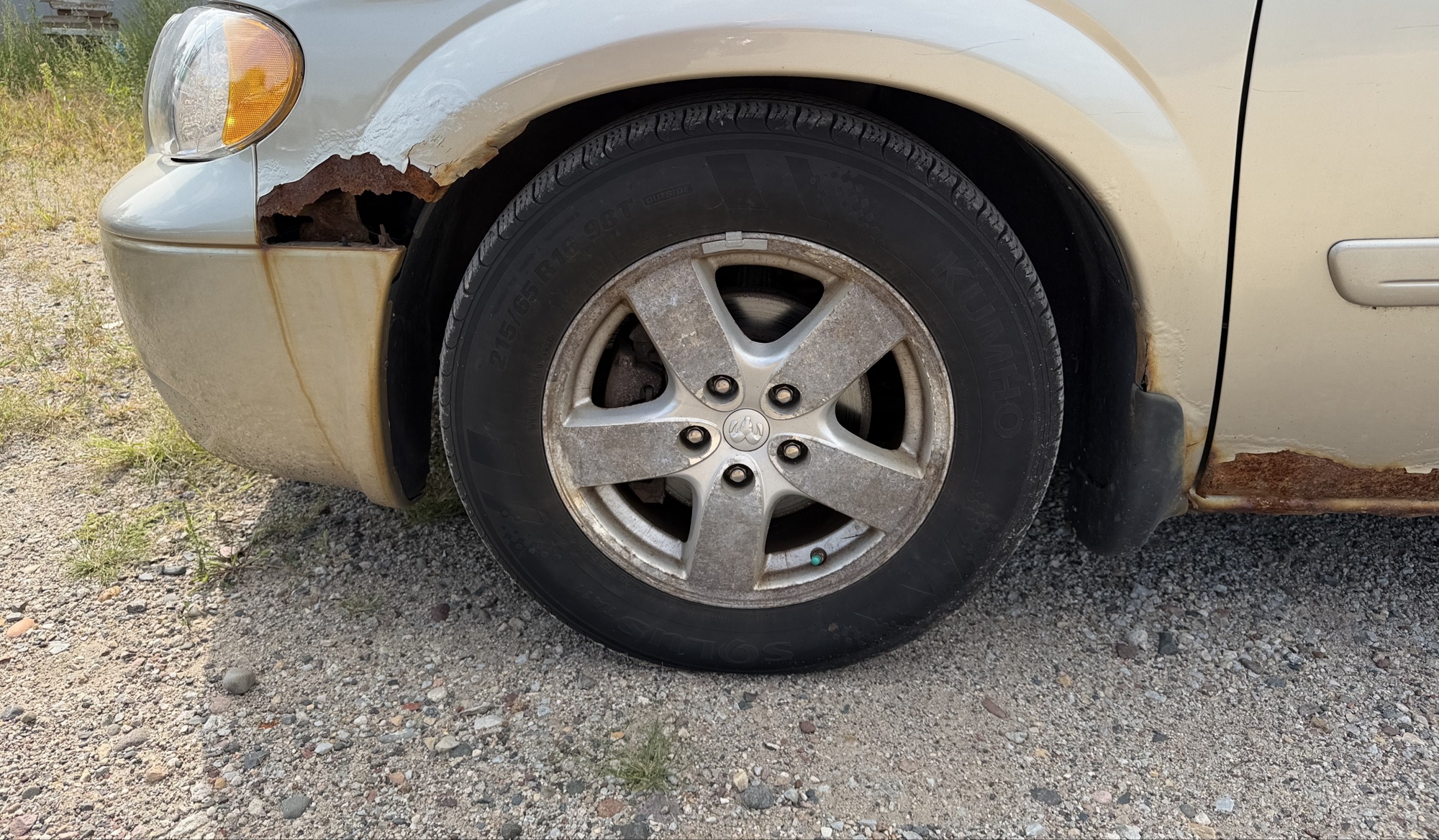 2007 dodge grand-caravan sxt with 141064 miles for sale near elk-river, minnesota 106358_12_drv_front_wheel.jpg