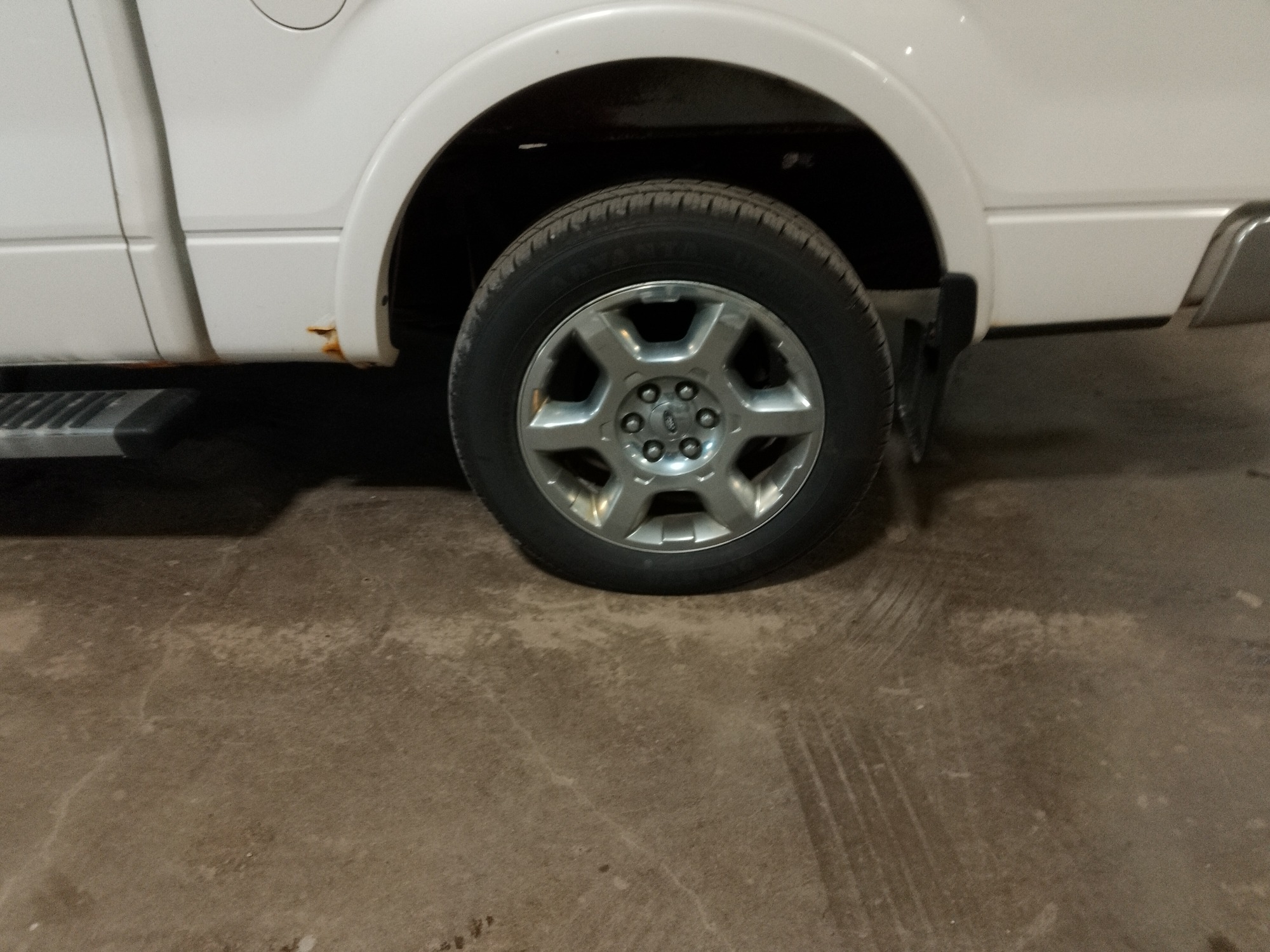 2013 ford f-150 fx4-supercrew-5.5-ft.-bed-4wd with 219754 miles for sale near elk-river, minnesota 106359_13_rear_drv_wheel.jpg