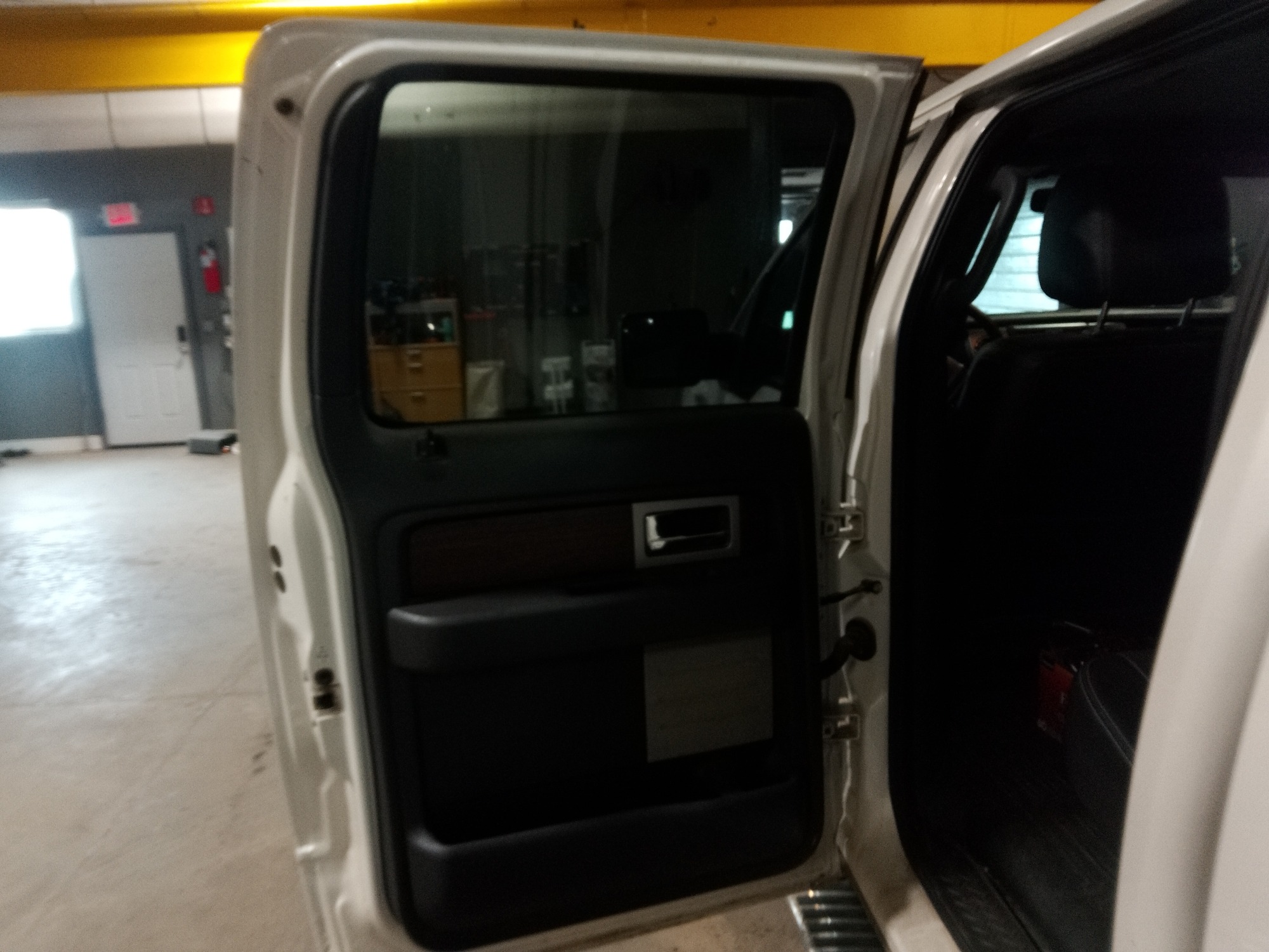 2013 ford f-150 fx4-supercrew-5.5-ft.-bed-4wd with 219754 miles for sale near elk-river, minnesota 106359_25_drv_rear_door_panel.jpg