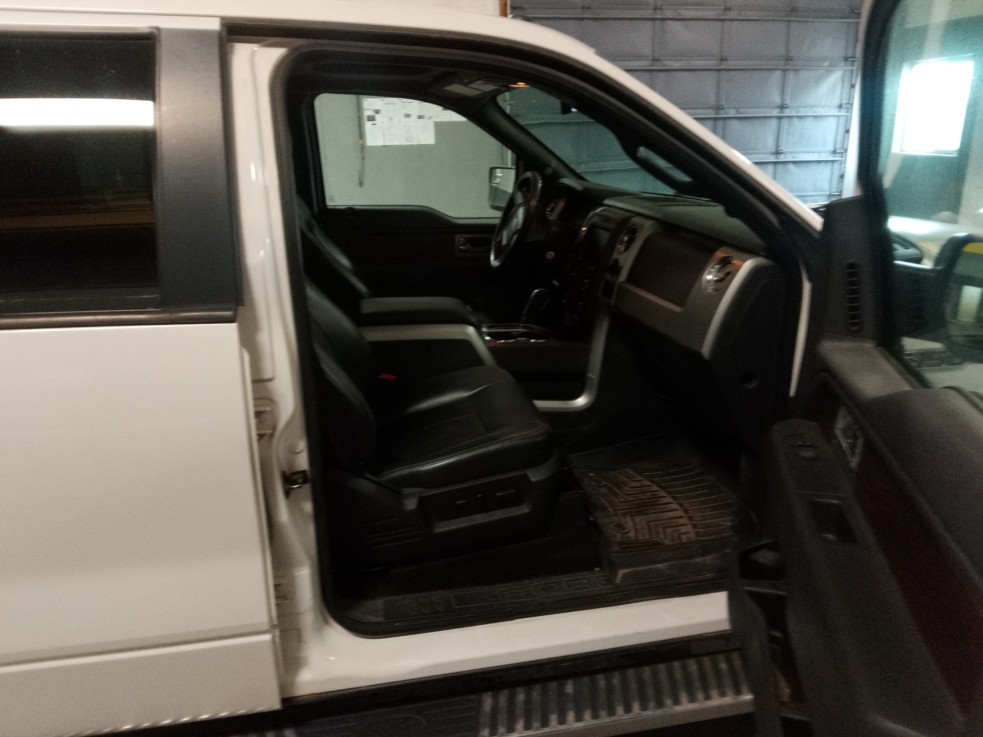 2013 ford f-150 fx4-supercrew-5.5-ft.-bed-4wd with 219754 miles for sale near elk-river, minnesota 106359_31_passenger_seat.jpg