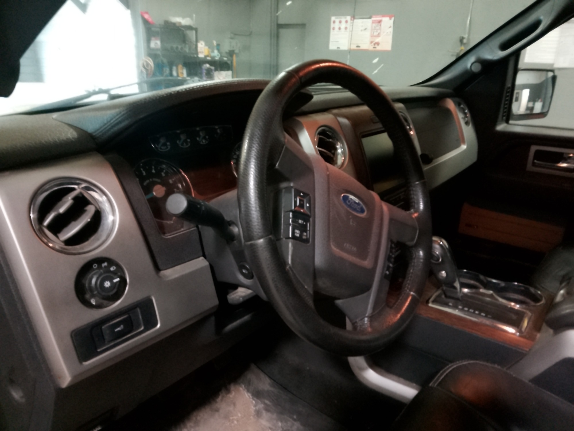 2013 ford f-150 fx4-supercrew-5.5-ft.-bed-4wd with 219754 miles for sale near elk-river, minnesota 106359_37_left_of_steering_wheel.jpg