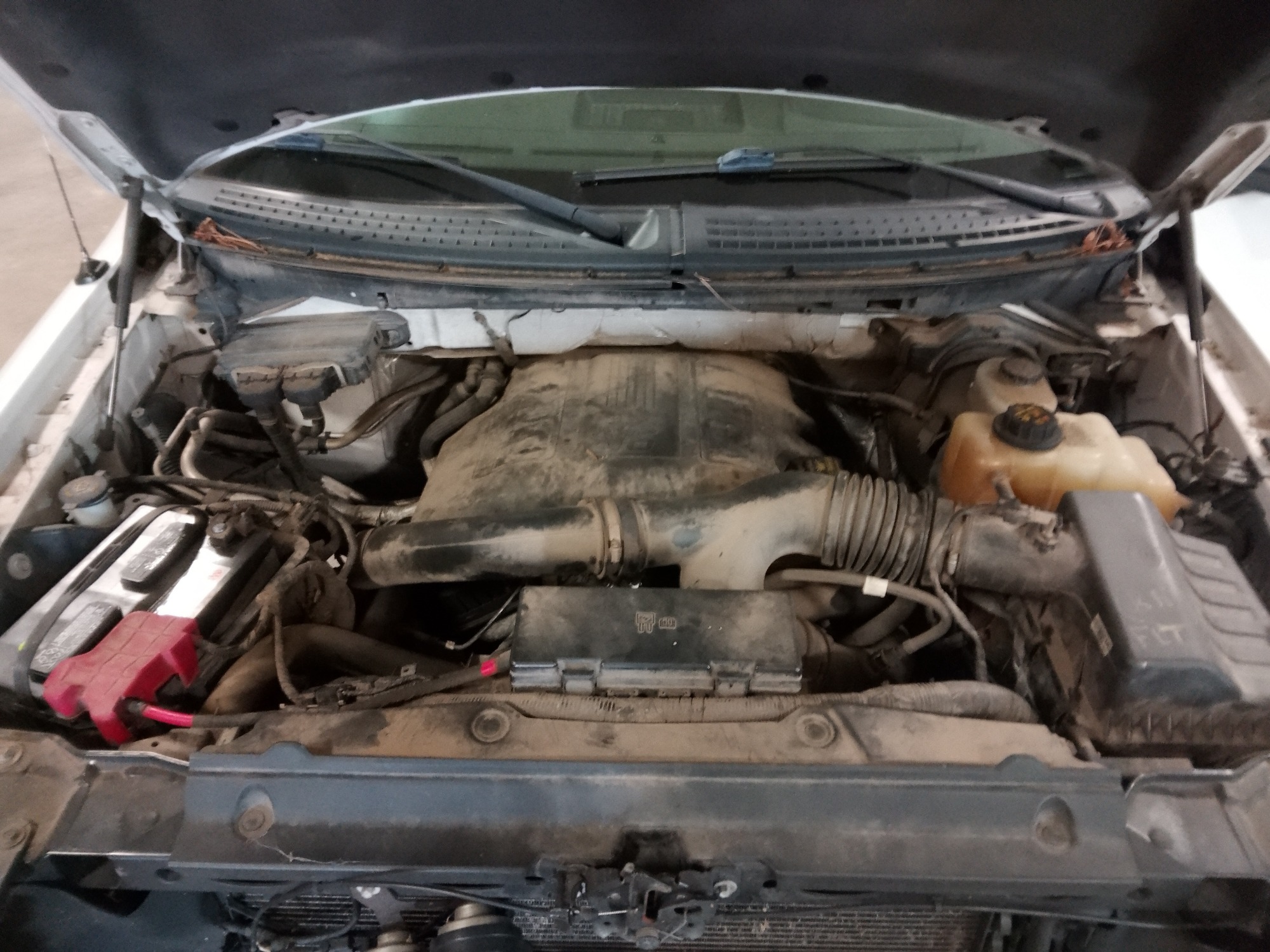 2013 ford f-150 fx4-supercrew-5.5-ft.-bed-4wd with 219754 miles for sale near elk-river, minnesota 106359_49_engine_bay.jpg