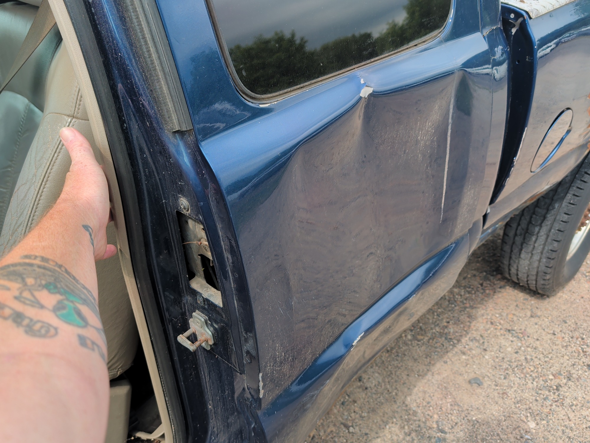 2002 chevrolet silverado-2500hd lt-ext.-cab-short-bed-4wd with 183890 miles for sale near elk-river, minnesota 106360_25_drv_rear_door_panel.jpg