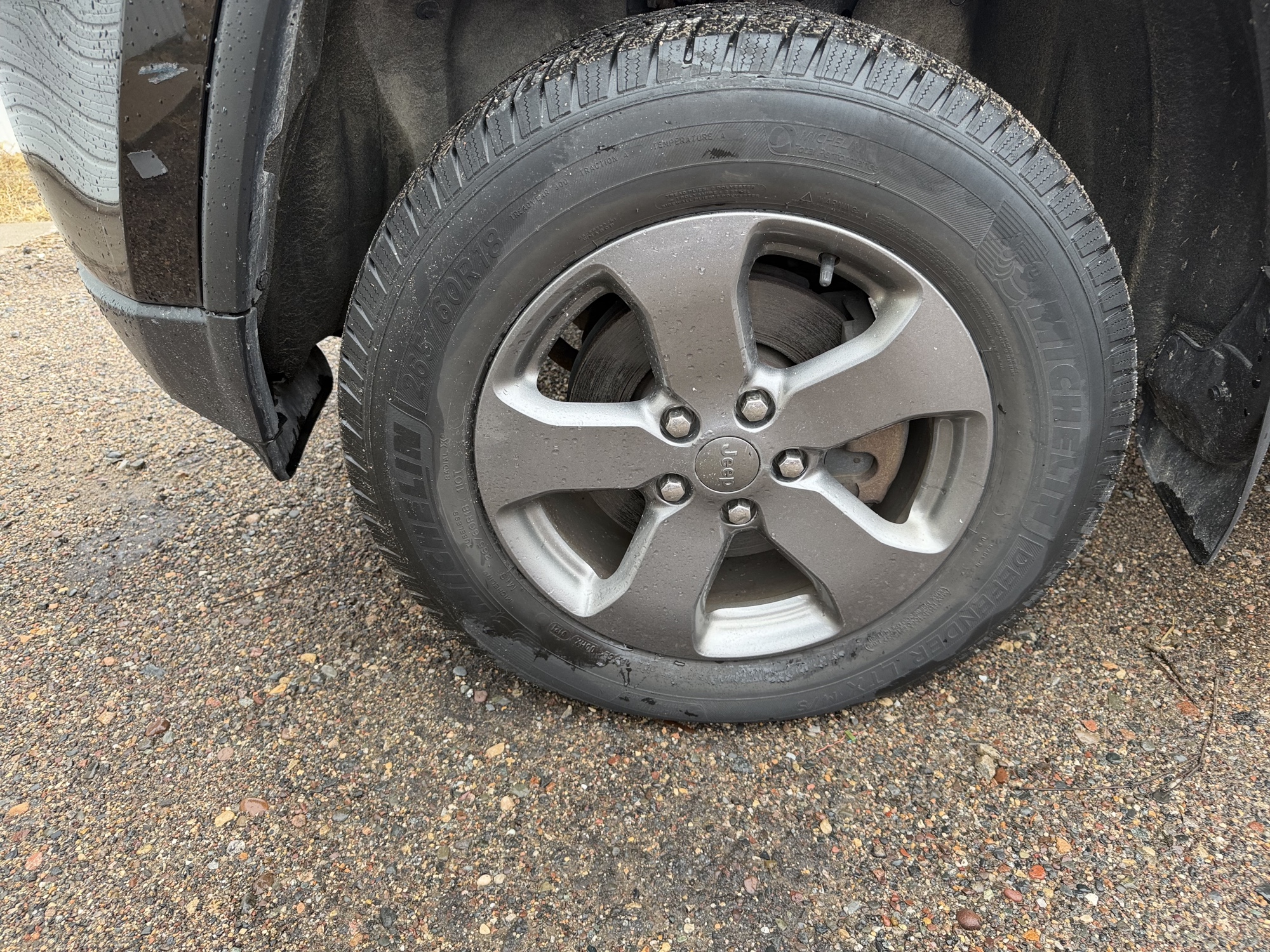 2013 jeep grand-cherokee laredo-4wd with 134157 miles for sale near elk-river, minnesota 106371_12_drv_front_wheel.jpg