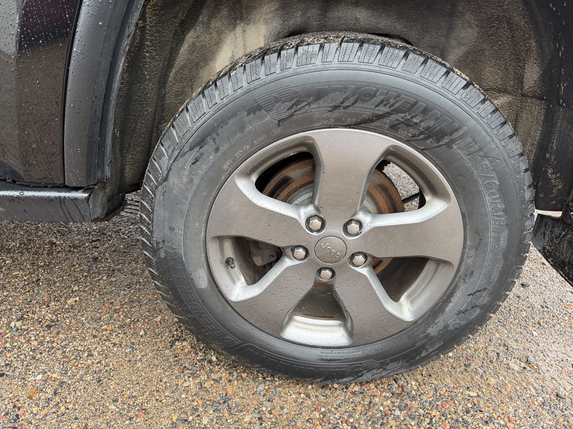 2013 jeep grand-cherokee laredo-4wd with 134157 miles for sale near elk-river, minnesota 106371_13_rear_drv_wheel.jpg