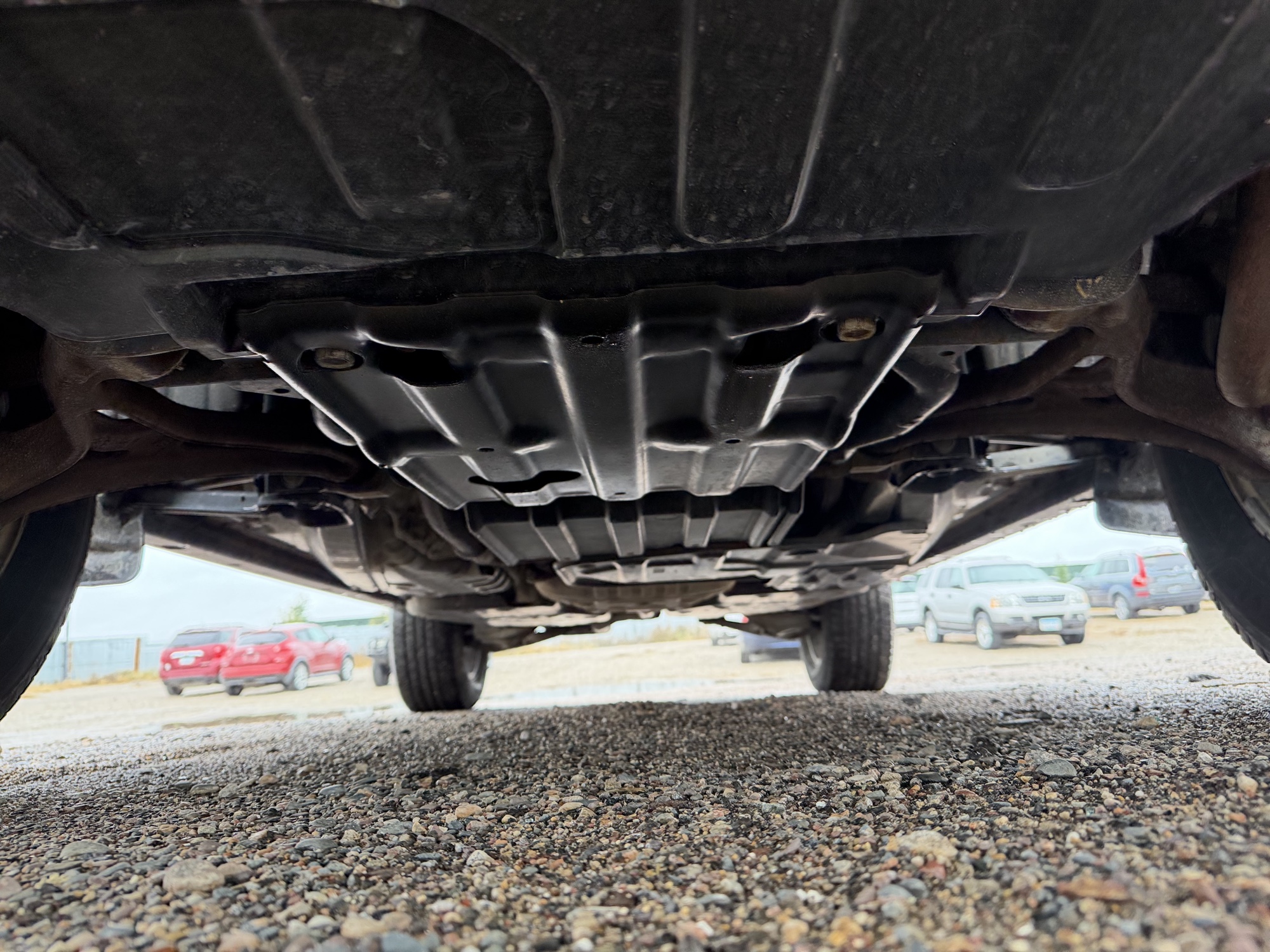 2013 jeep grand-cherokee laredo-4wd with 134157 miles for sale near elk-river, minnesota 106371_16_undercar_front.jpg