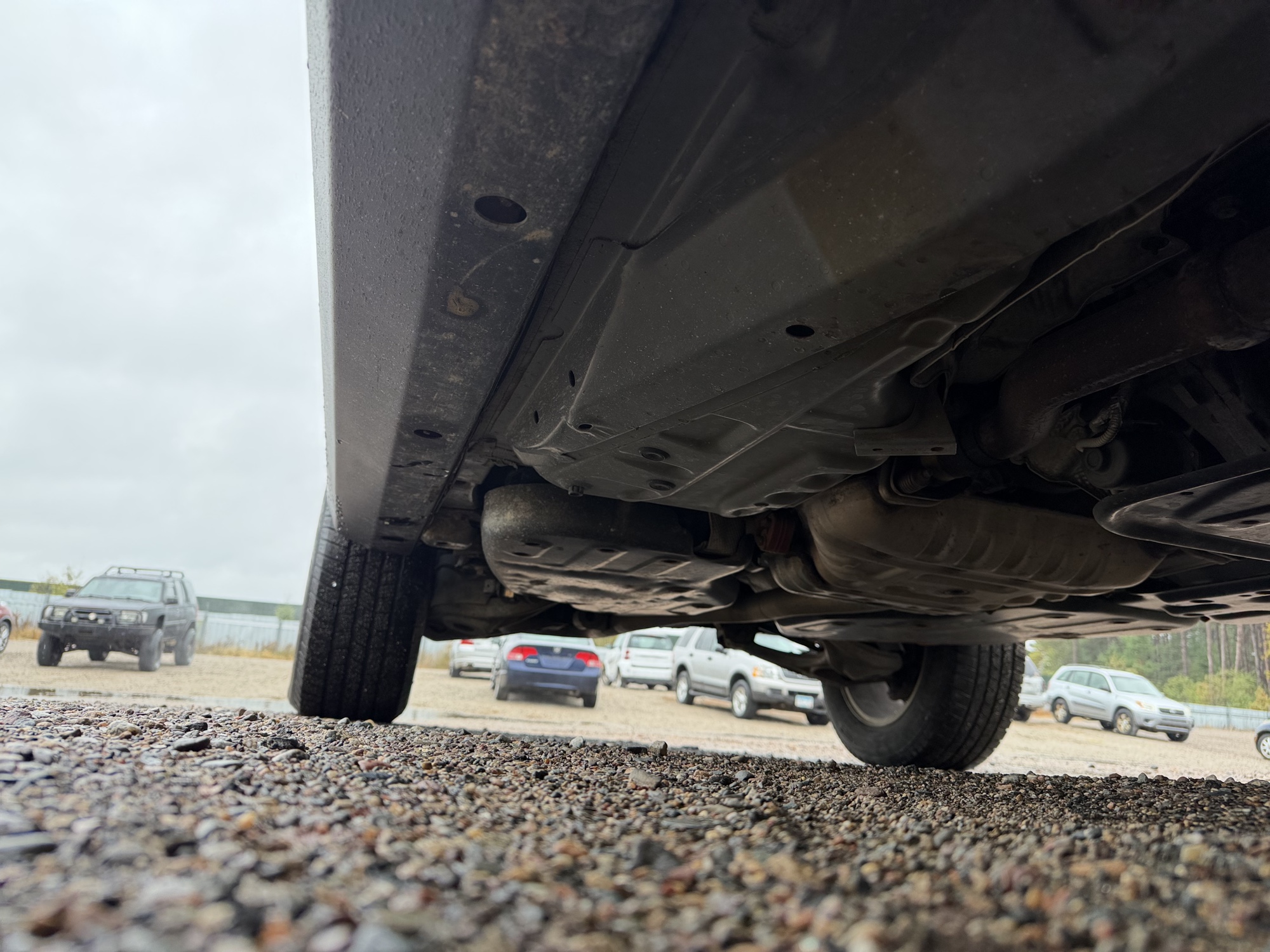 2013 jeep grand-cherokee laredo-4wd with 134157 miles for sale near elk-river, minnesota 106371_21_undercar_pass_side.jpg